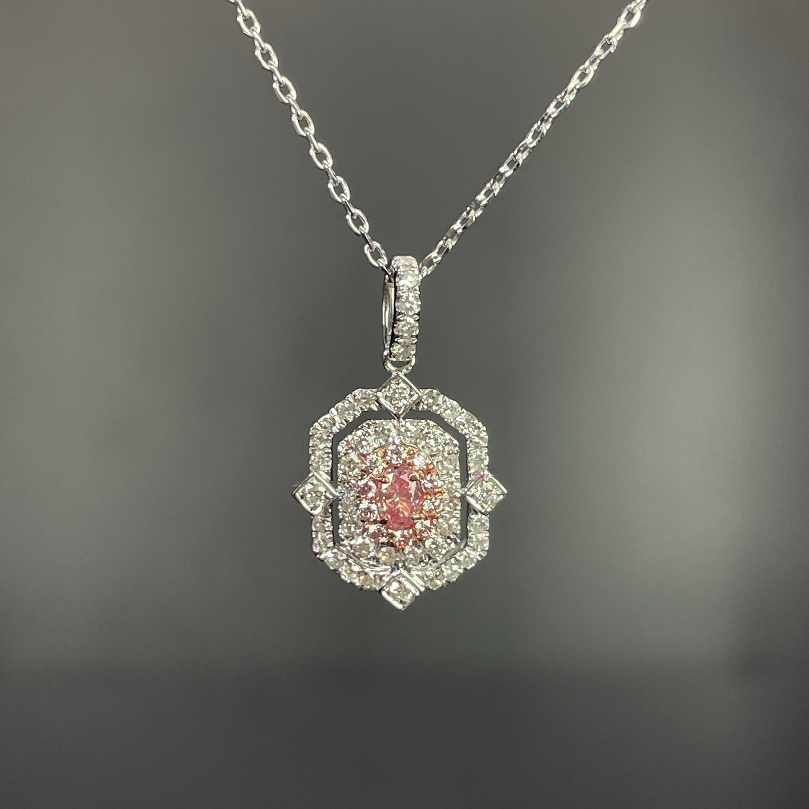 14k Gold 0.46 Ctw Natural Pink Diamond & Diamond Pendant( Without Chain ): Ref:231168192 // gold content:14k gold // main gemstone:pink diamond // shape:oval // carat weight:0. 13ct // color:pink // treatment:natural // // adjacent gemstone 2 : diamond // shape:round //
