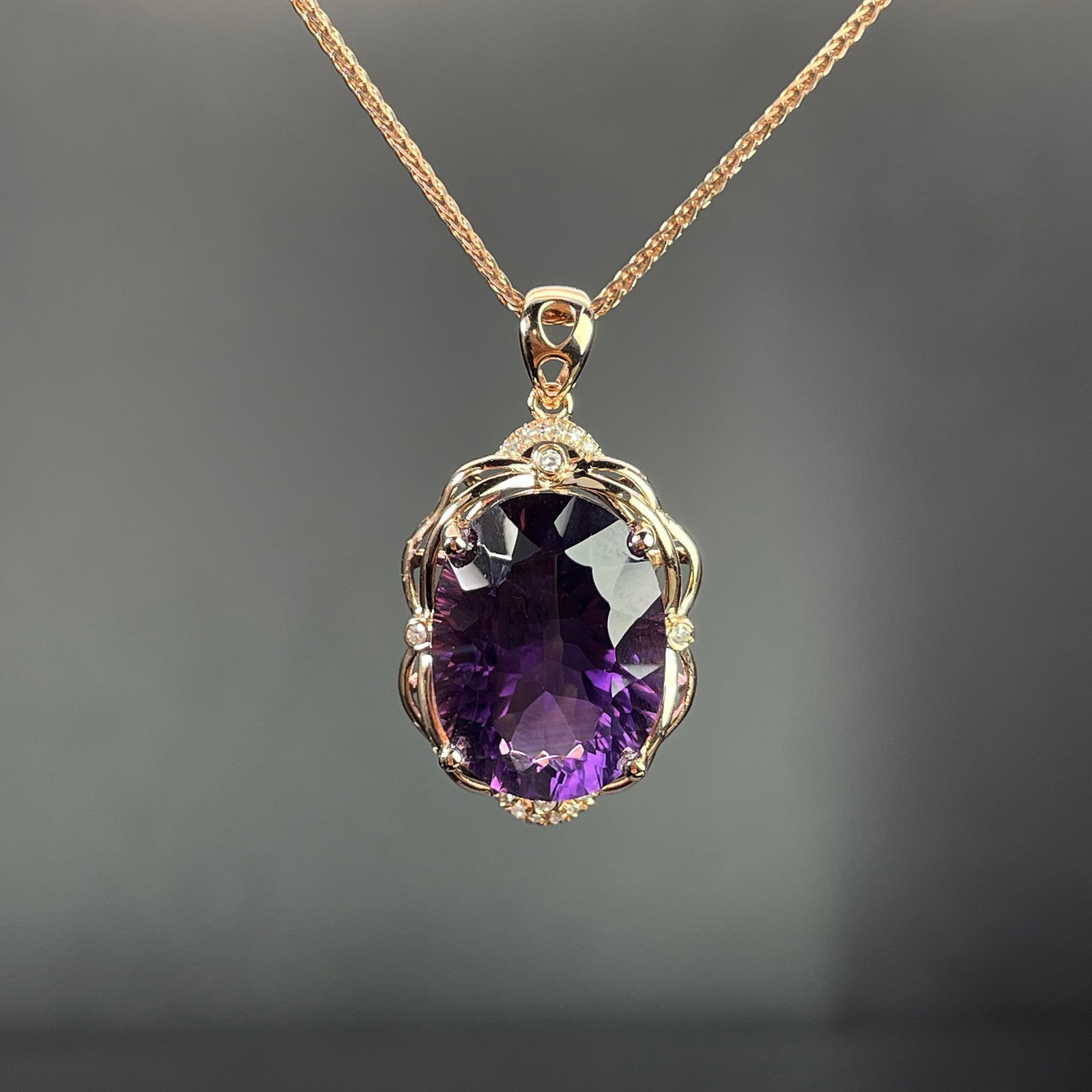 14k Gold 9.40 Ctw Natural Amethyst & Diamond Pendant( Without Chain ): Ref:231168193 // gold content:14k gold // main gemstone:amethyst // shape:oval // carat weight:9. 35ct // color:purple // treatment:natural // // adjacent gemstone 2 : diamond // shape:round // carat