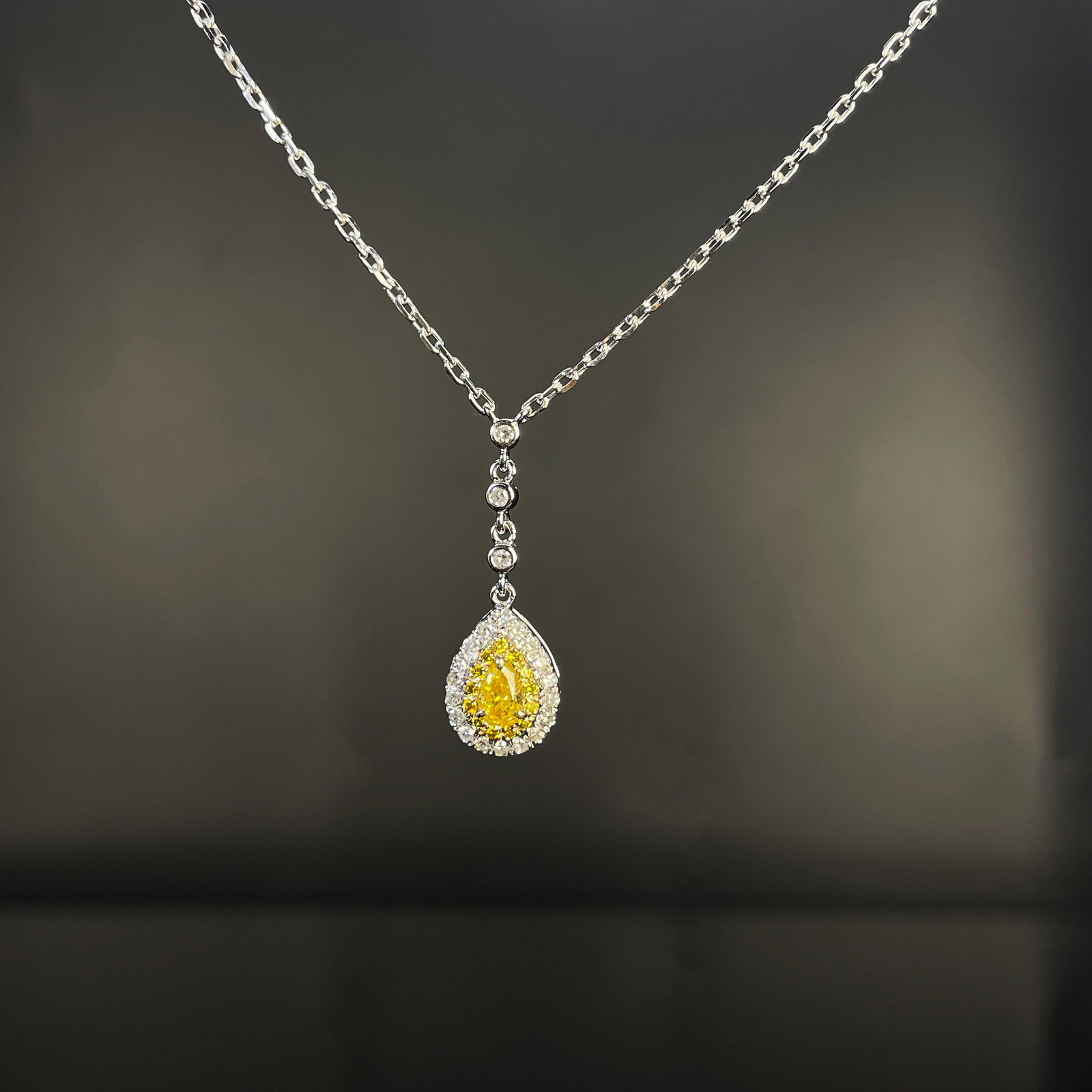 14k Gold 0.36 Ctw Natural Yellow Diamond & Diamond Necklace: Ref:231168211 // gold content:14k gold // main gemstone:yellow diamond // shape:pear // carat weight:0. 16ct // color:yellow // treatment:natural // // adjacent gemstone 2 : diamond // shape:round //