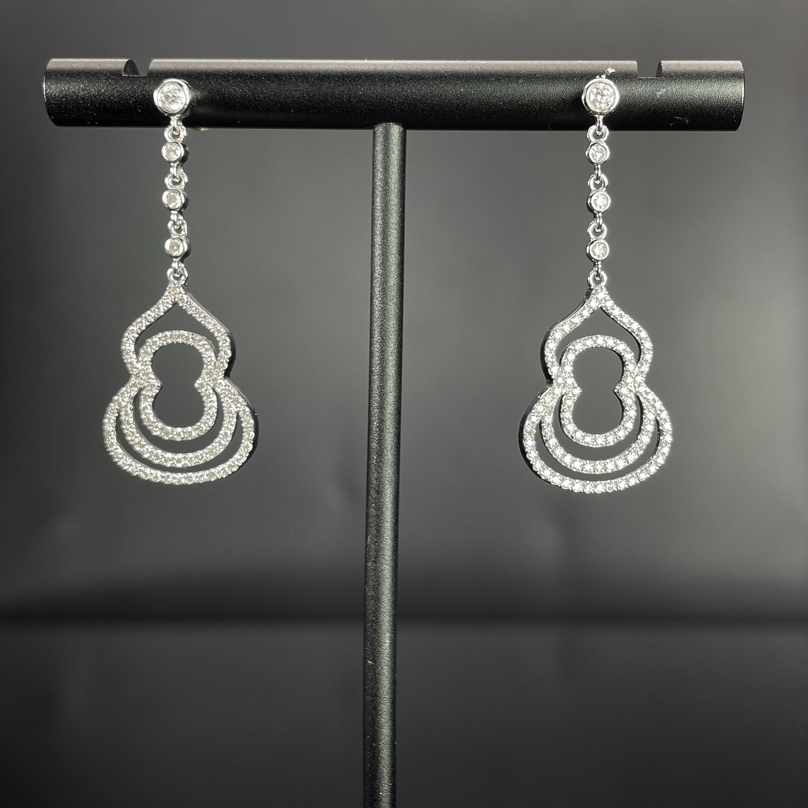 14k Gold 0.62 Ct Natural H Diamond Earrings: Ref:231168213 // gold content:14k gold // main gemstone:diamond // shape:round // carat weight:0. 62ct // clarity grade:vs-si // color:h // treatment:natural // cut grade:g // Condition: New Low Estim