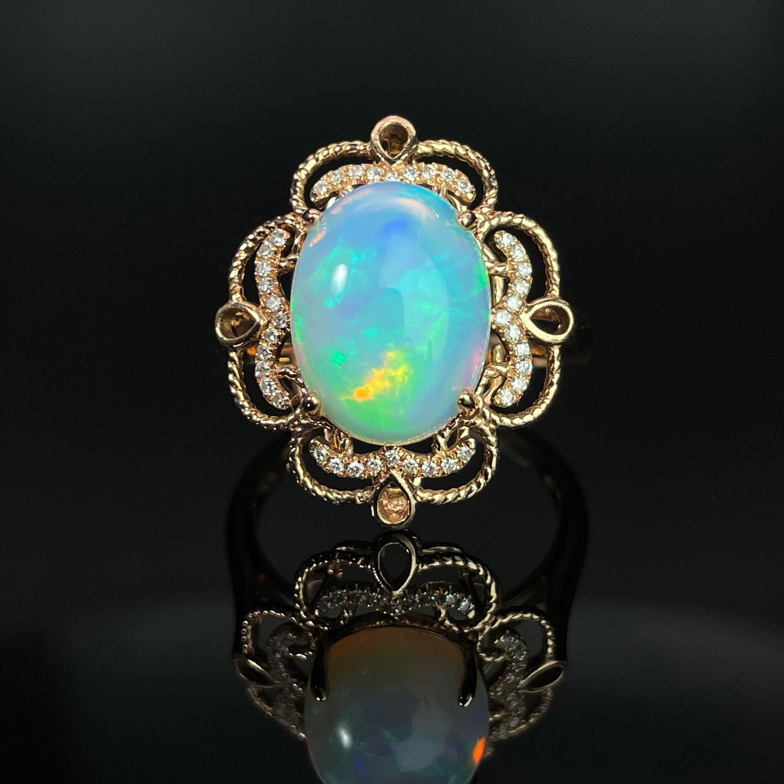 14k Gold 3.52 Ctw Natural Opal & Diamond Ring: Ref:231168231 // gold content:14k gold // ring size:7. 25us // // main gemstone:opal // shape:oval // carat weight:3. 4ct // color:color // treatment:natural // // adjacent gemstone 2 : diamond //