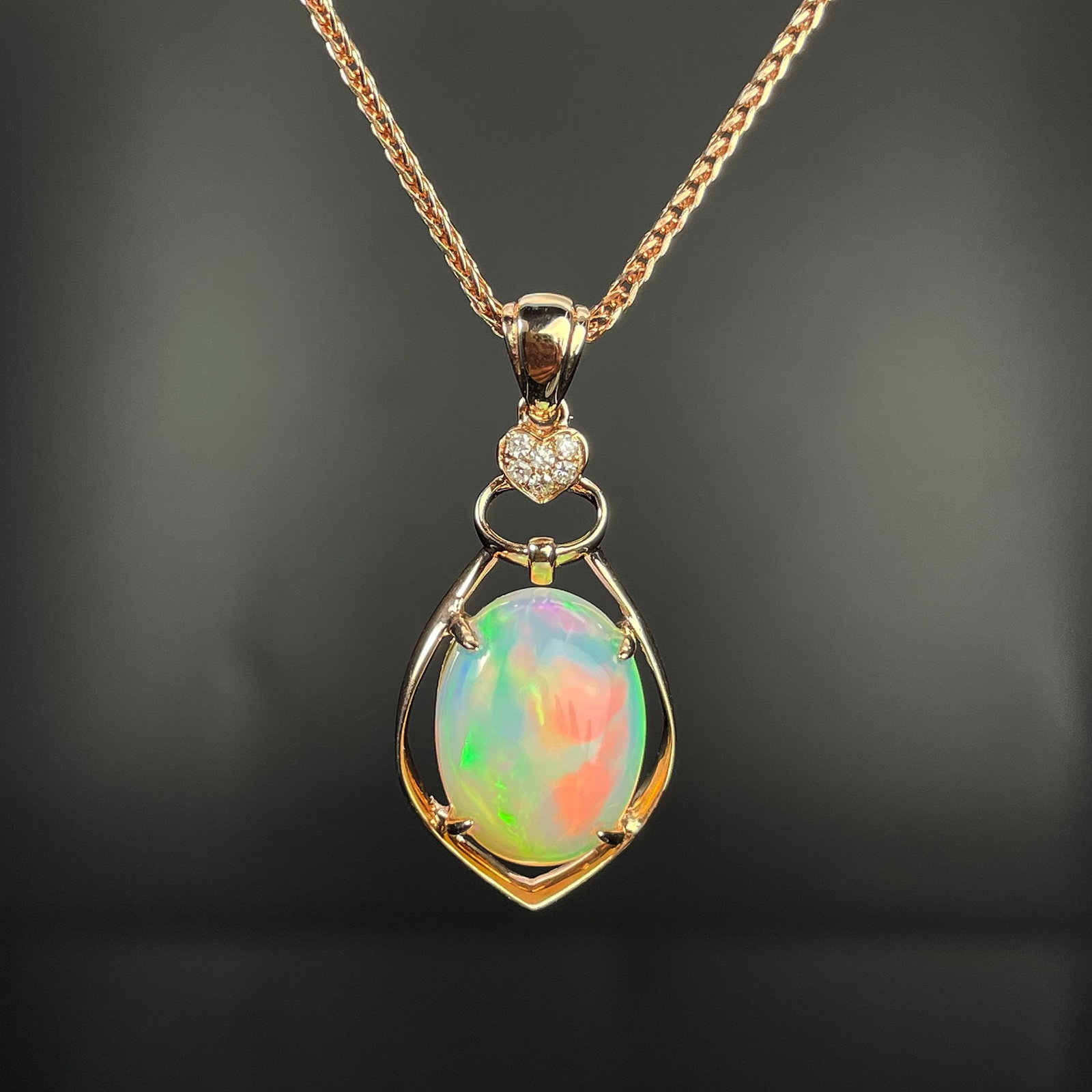 14k Gold 2.86 Ctw Natural Opal & Diamond Pendant( Without Chain ): Ref:231168235 // gold content:14k gold // main gemstone:opal // shape:oval // carat weight:2. 82ct // color:color // treatment:natural // // adjacent gemstone 2 : diamond // shape:round // carat