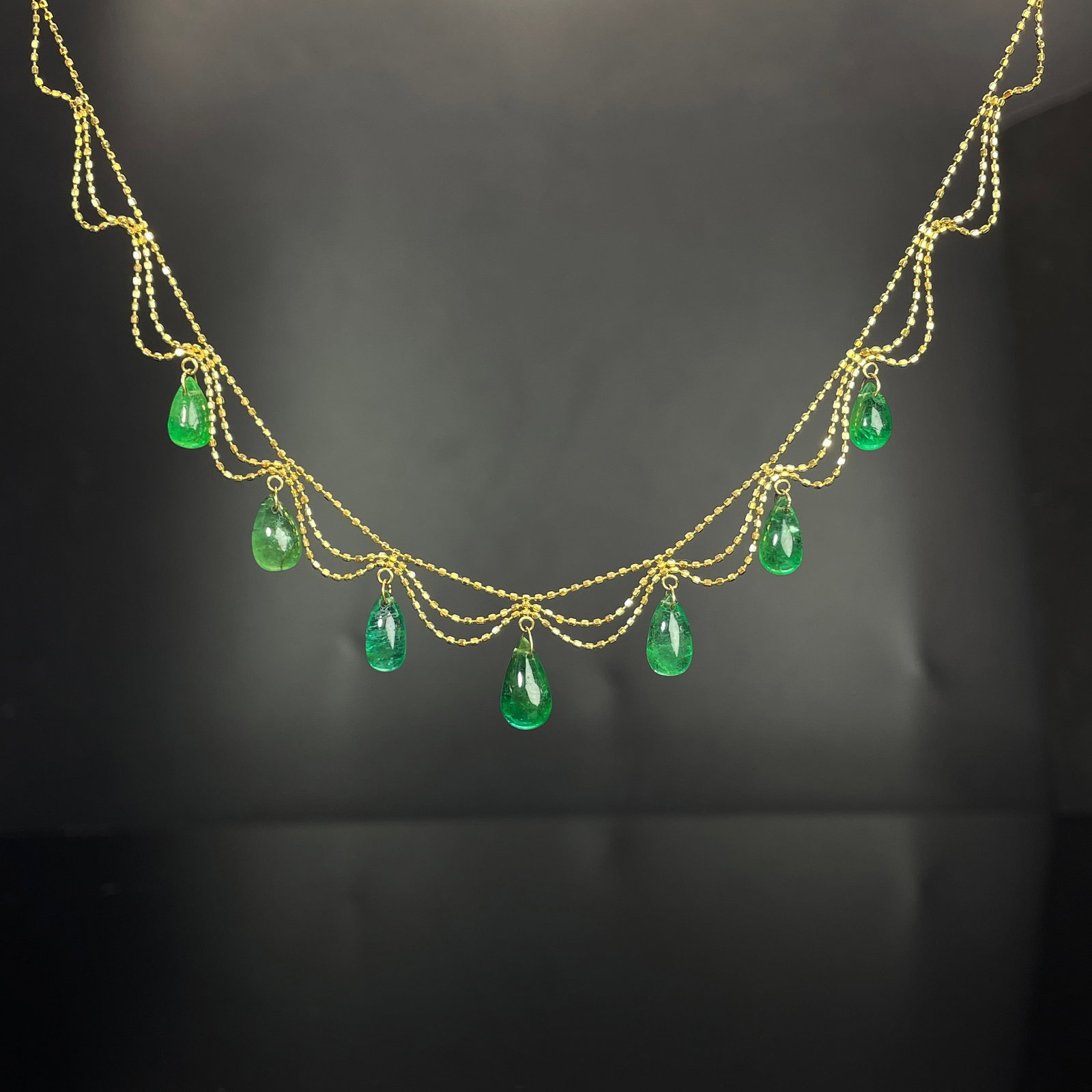 14k Gold 8.05 Ct Natural Emerald Necklace: Ref:231168237 // gold content:14k gold // main gemstone:emerald // shape:pear // carat weight:8. 05ct // color:green // treatment:natural // Condition: New Low Estimate: 8100.00 High Estimate: