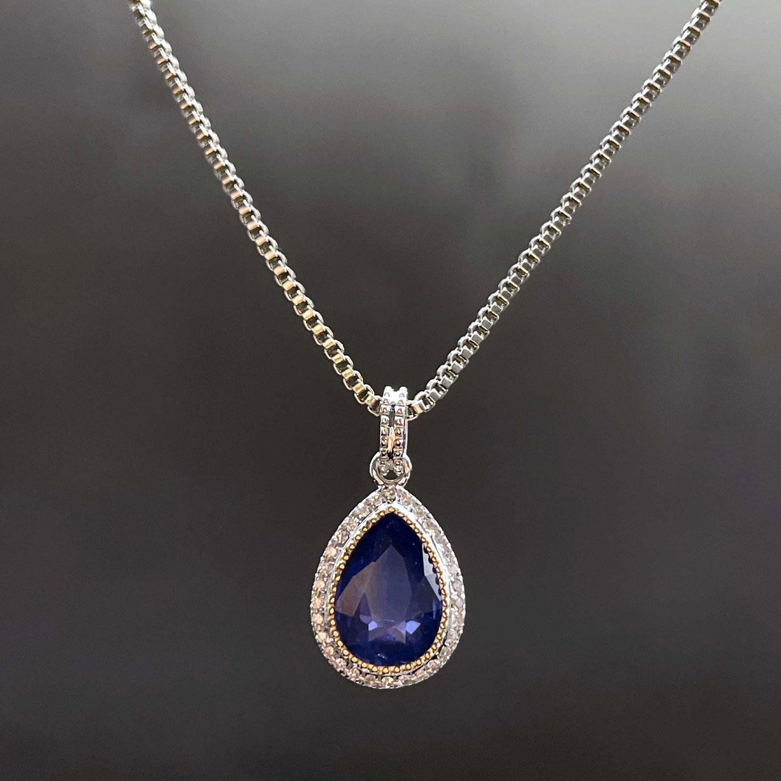 14k Gold 1.6 Ctw Natural Sapphire & Diamond Pendant( Without Chain ): Ref:231168284 // gold content:14k gold // main gemstone:sapphire // shape:pear // carat weight:1. 5ct // color:royal blue // treatment:natural // // adjacent gemstone 2 : diamond // shape:round //