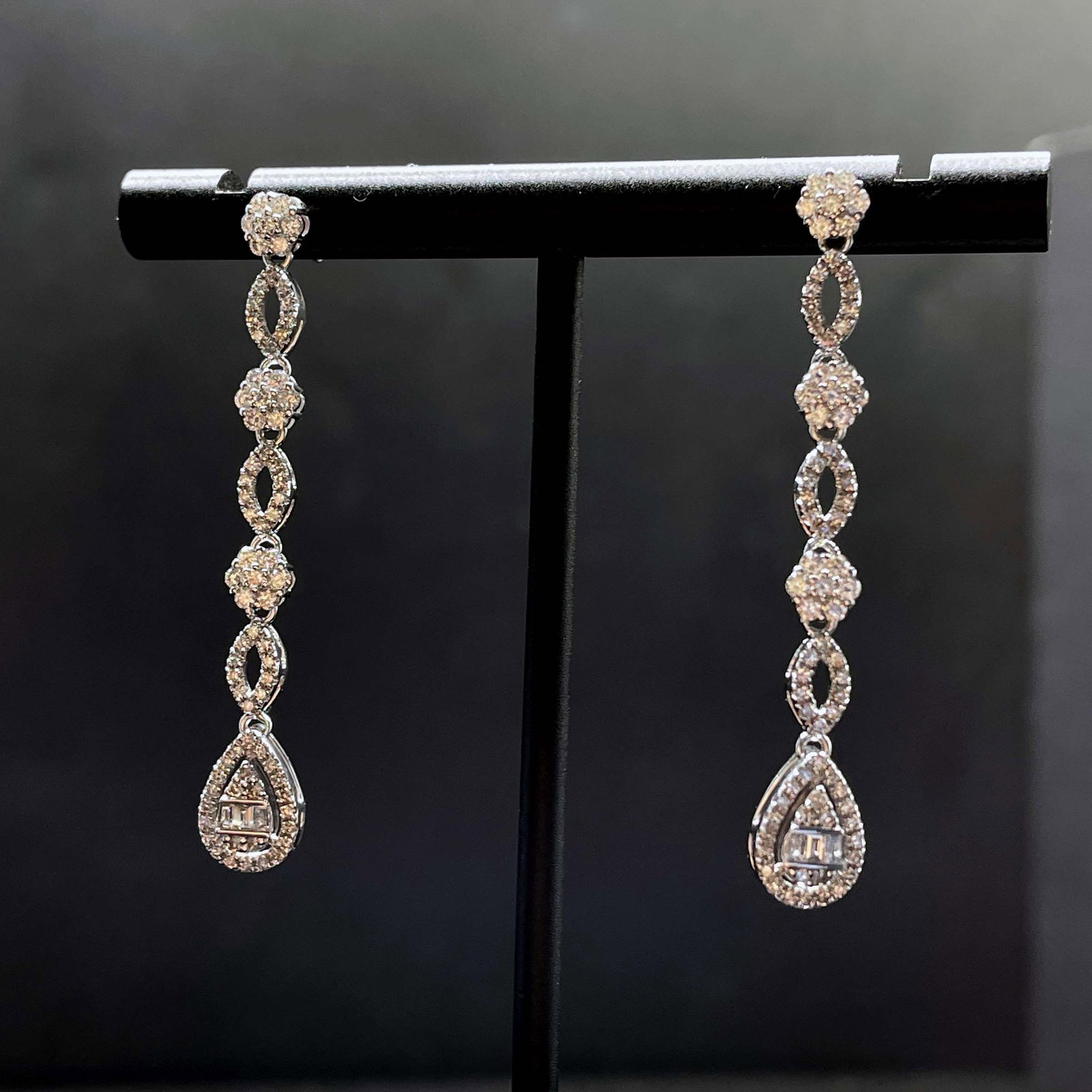 14k Gold 1.02 Ct Natural H Diamond Earrings: Ref:231168285 // gold content:14k gold // main gemstone:diamond // shape:multiple // carat weight:1. 02ct // clarity grade:vs-si // color:h // treatment:natural // Low Estimate: 2400 Condition: New