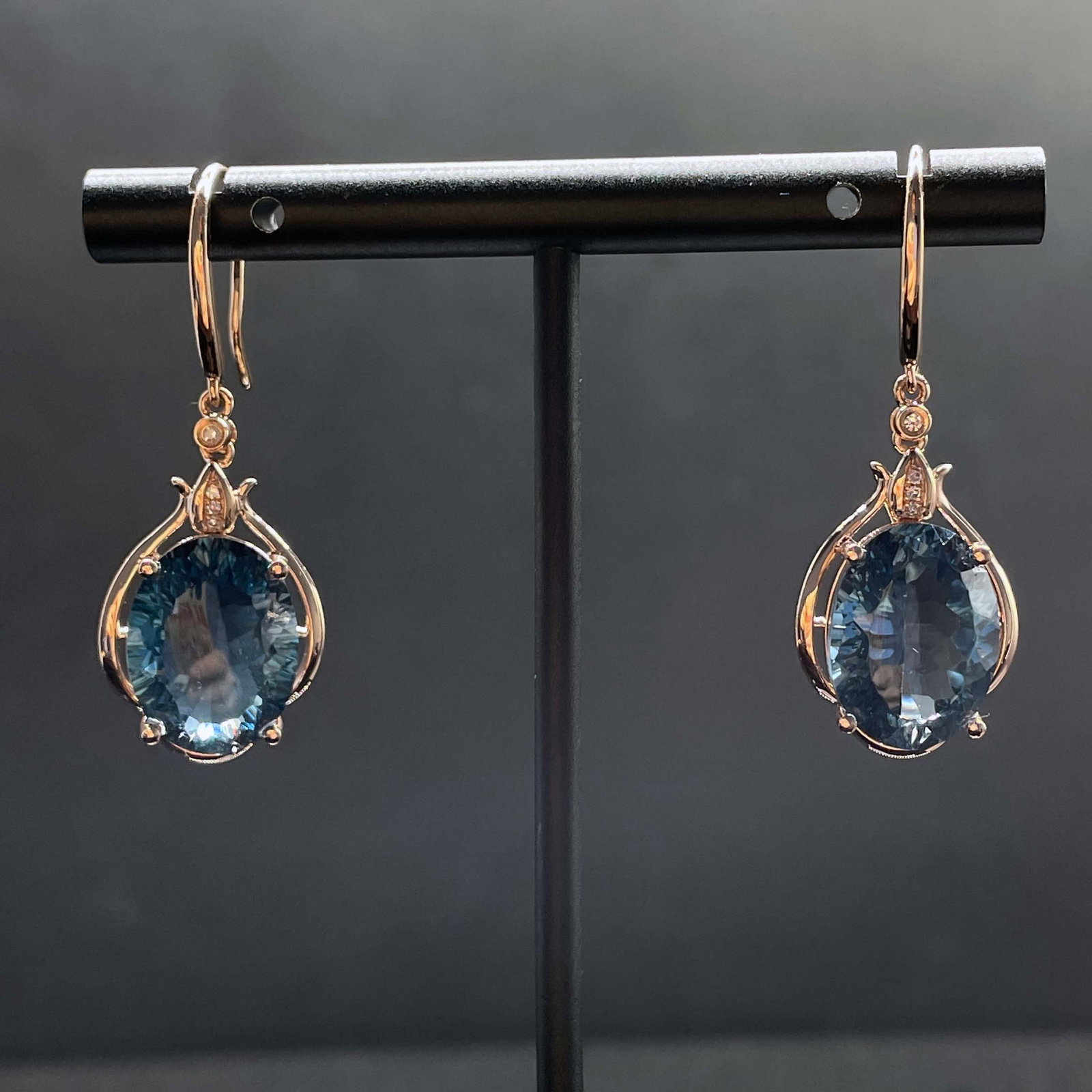 14k Gold 10.23 Ctw Natural Topaz & Diamond Earrings: Ref:231168286 // gold content:14k gold // main gemstone:topaz // shape:oval // carat weight:10. 2ct // color:blue // treatment:natural // // adjacent gemstone 2 : diamond // shape:round // carat