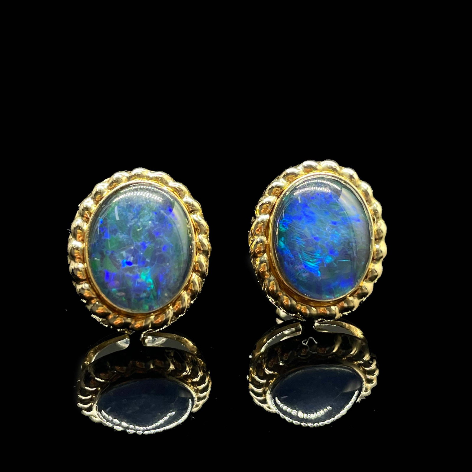 14k Gold 1.3 Ct Natural Opal Earrings: Ref:231168288 // gold content:14k gold // main gemstone:opal // shape:oval // carat weight:1. 3ct // color:color // treatment:natural // Low Estimate: 1200 Condition: New High Estimate: 1800