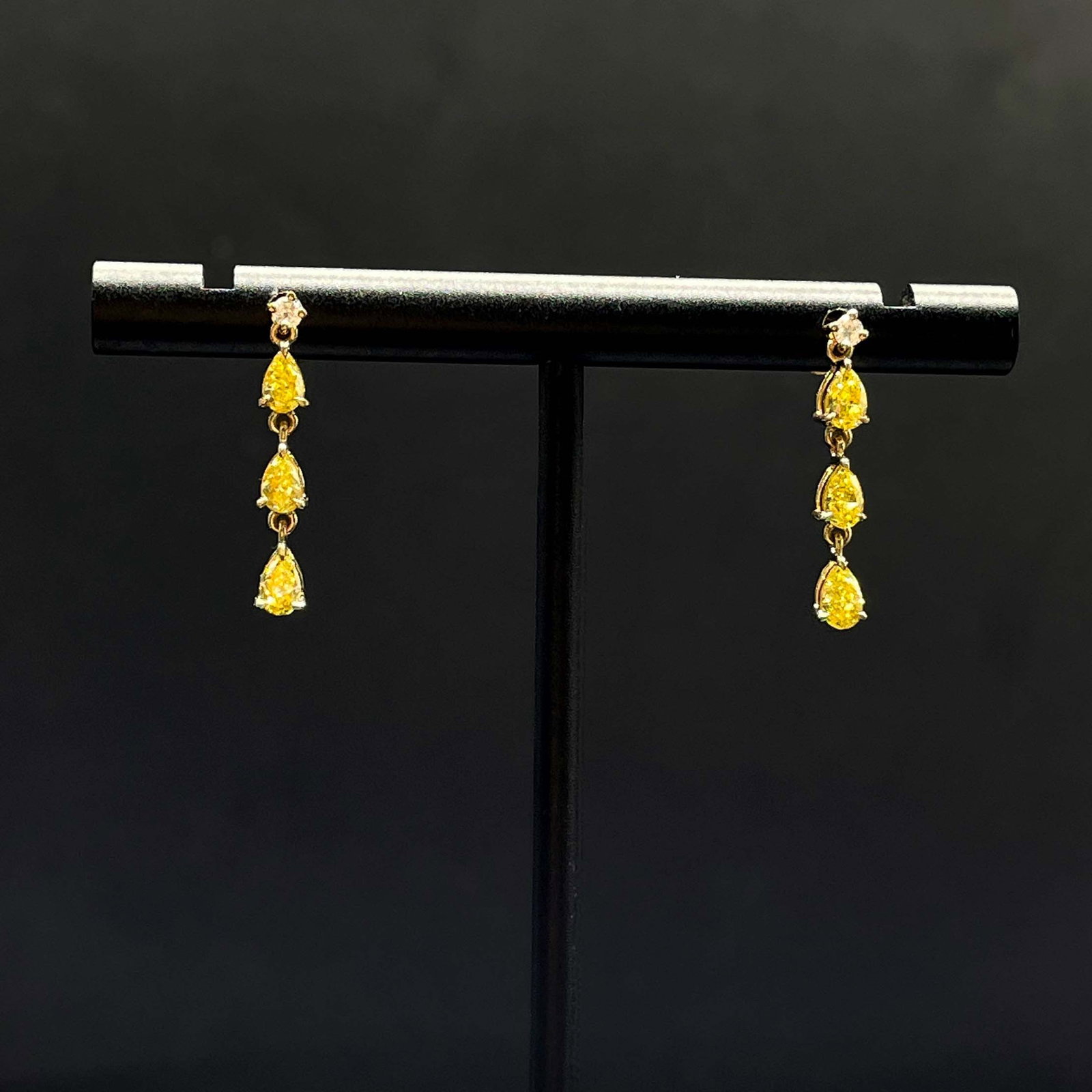 14k Gold 0.82 Ctw Natural Yellow Diamond & Diamond Earrings: Ref:231168302 // gold content:14k gold // main gemstone:yellow diamond // shape:pear // carat weight:0. 78ct // color:yellow // treatment:natural // // adjacent gemstone 2 : diamond // shape:round // 