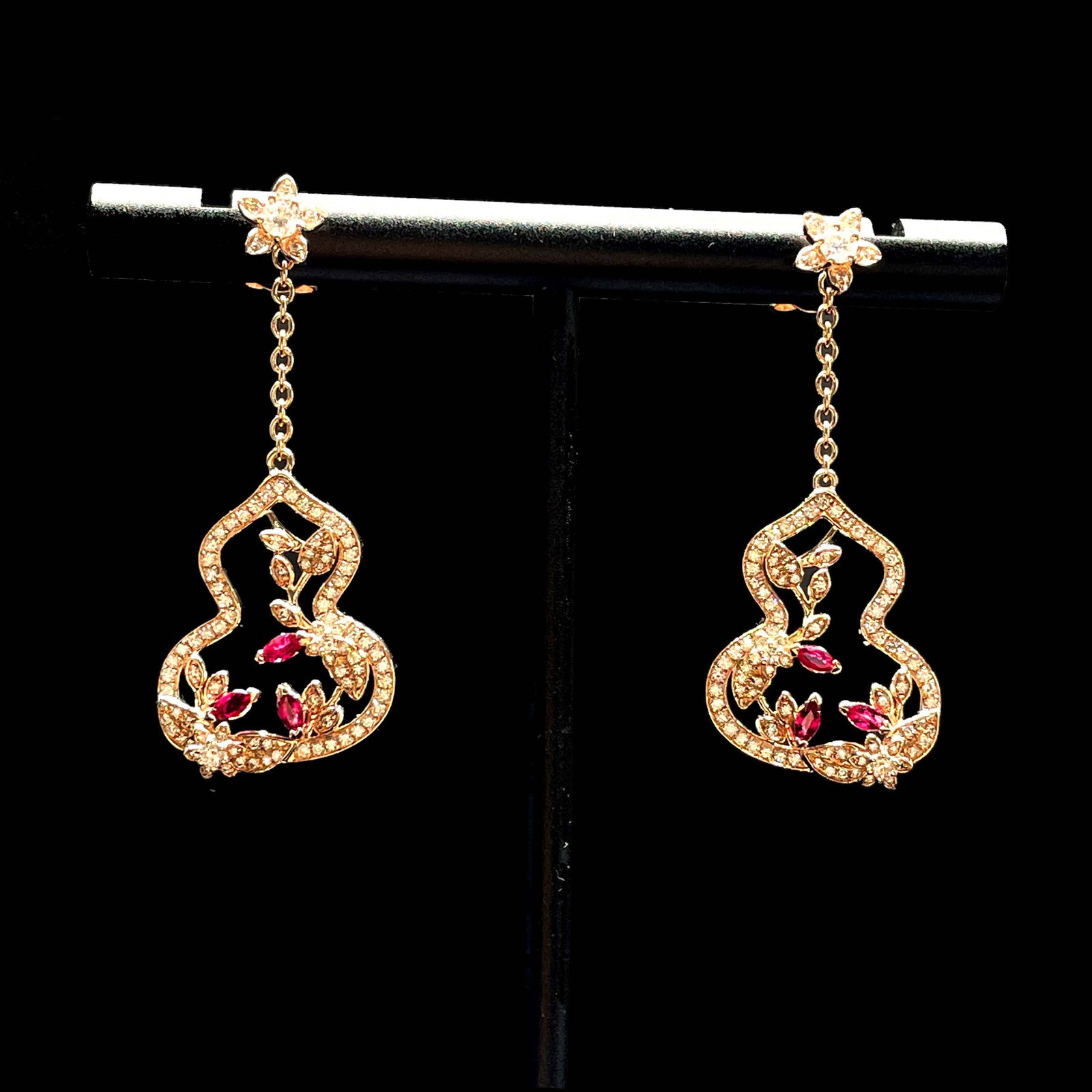 14k Gold 1.0 Ctw Natural Ruby & Diamond Earrings: Ref:231168304 // gold content:14k gold // main gemstone:ruby // shape:marquise // carat weight:0. 3ct // color:red // treatment:natural // // adjacent gemstone 2 : diamond // shape:round // carat