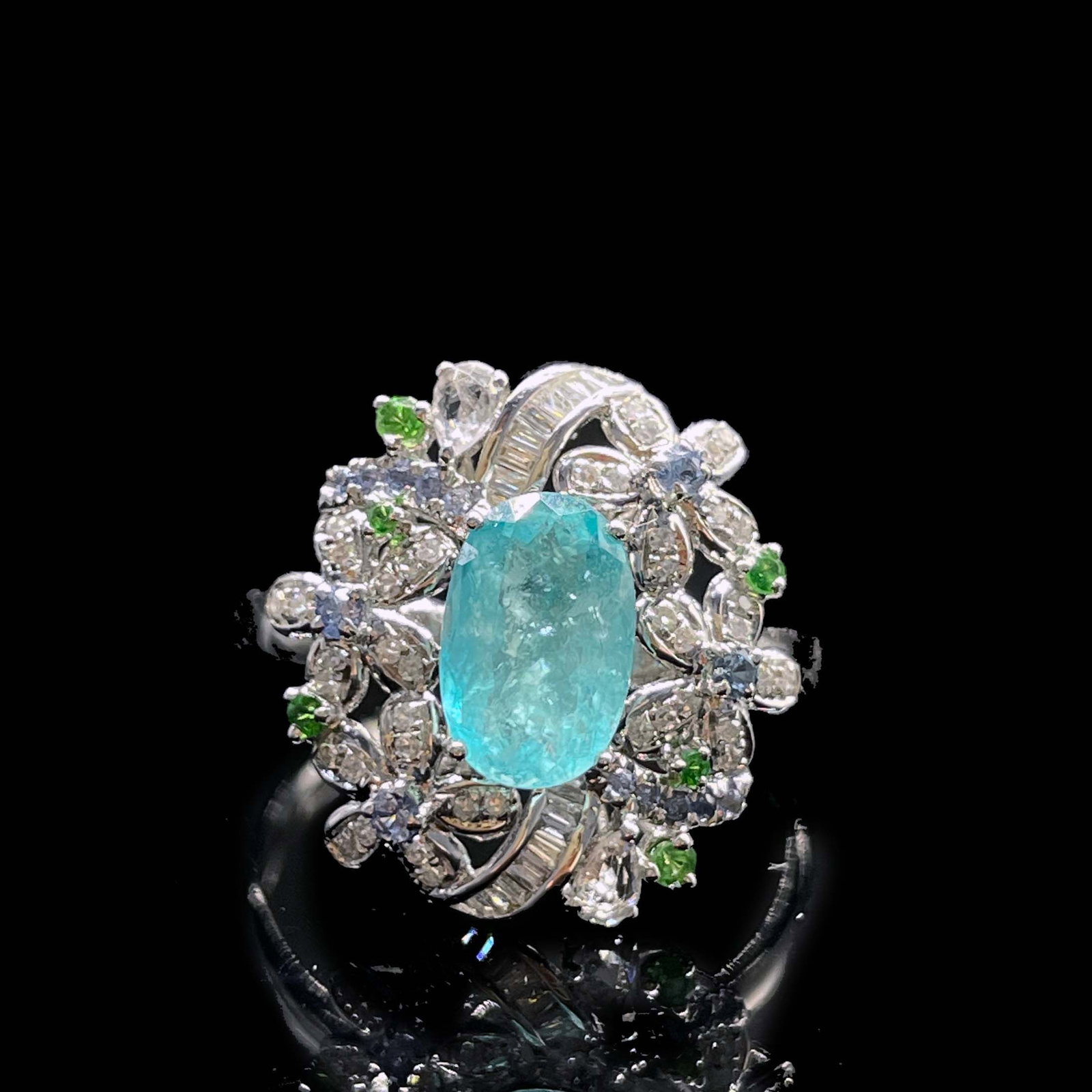 14k Gold 1.53 Ctw Natural Paraiba Tourmaline & Diamond Ring: Ref:231168324 // gold content:14k gold // ring size:7. 25us // // main gemstone:paraiba tourmaline // shape:oval // carat weight:1. 2ct // color:blue // treatment:natural // // adjacent gemstone 2 :