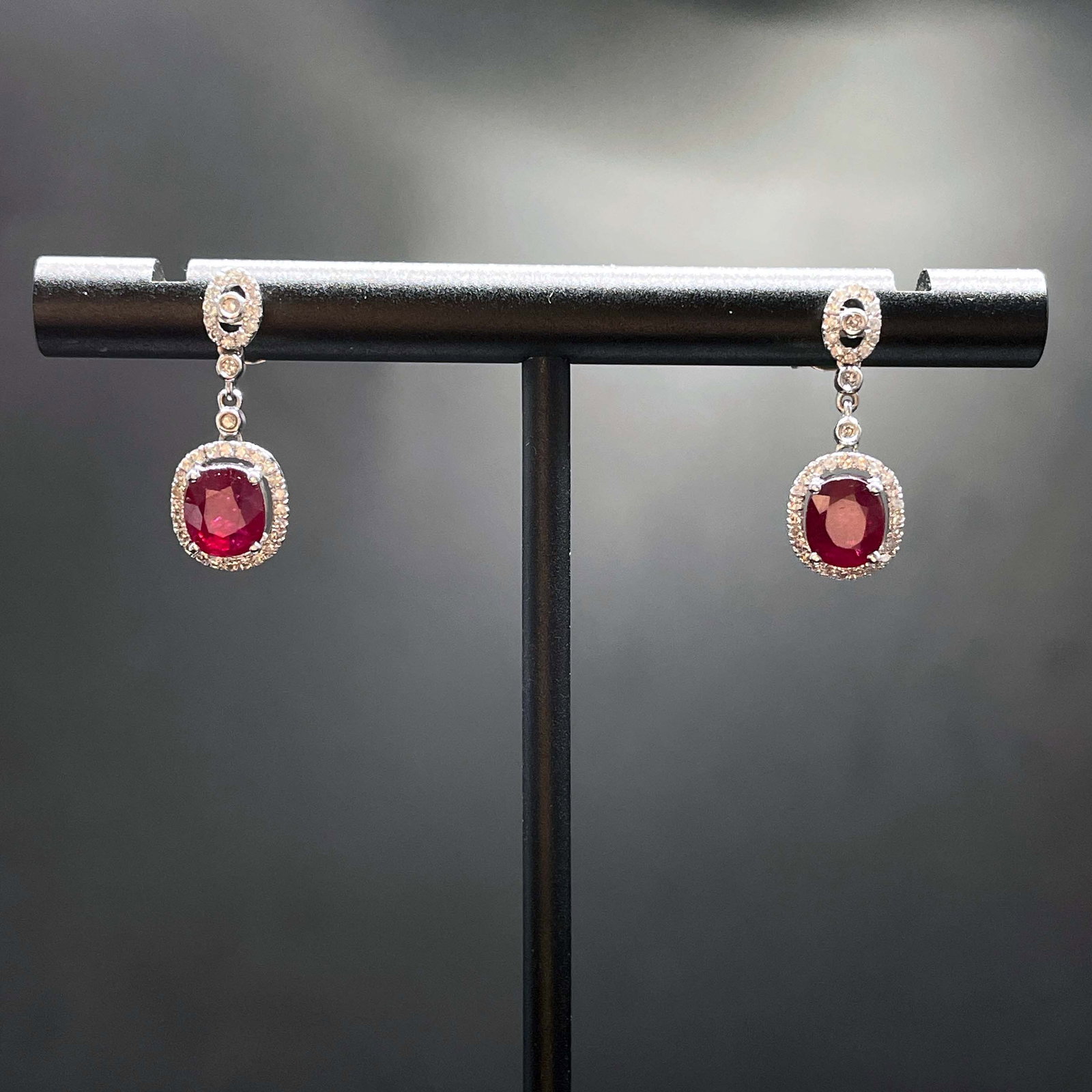 14k Gold 1.61 Ctw Natural Ruby & Diamond Earrings: Ref:231168364 // gold content:14k gold // main gemstone:ruby // shape:oval // carat weight:1. 3ct // color:pigeonblood red // treatment:natural // // adjacent gemstone 2 : diamond // shape:round // ca