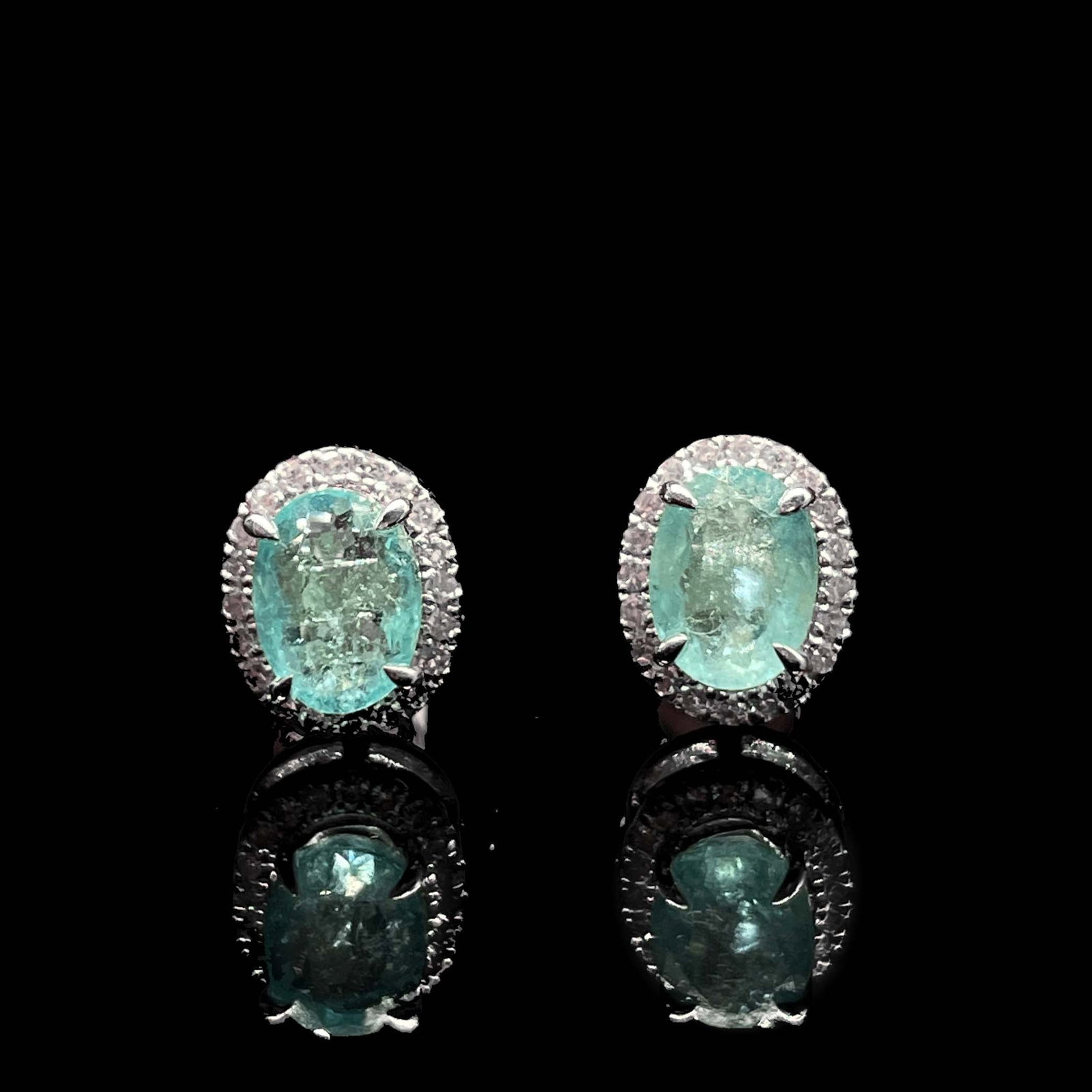 14k Gold 1.25 Ctw Natural Paraiba Tourmaline & Diamond Earrings: Ref:231168366 // gold content:14k gold // main gemstone:paraiba tourmaline // shape:oval // carat weight:0. 9ct // color:blue // treatment:natural // // adjacent gemstone 2 : diamond // shape:round