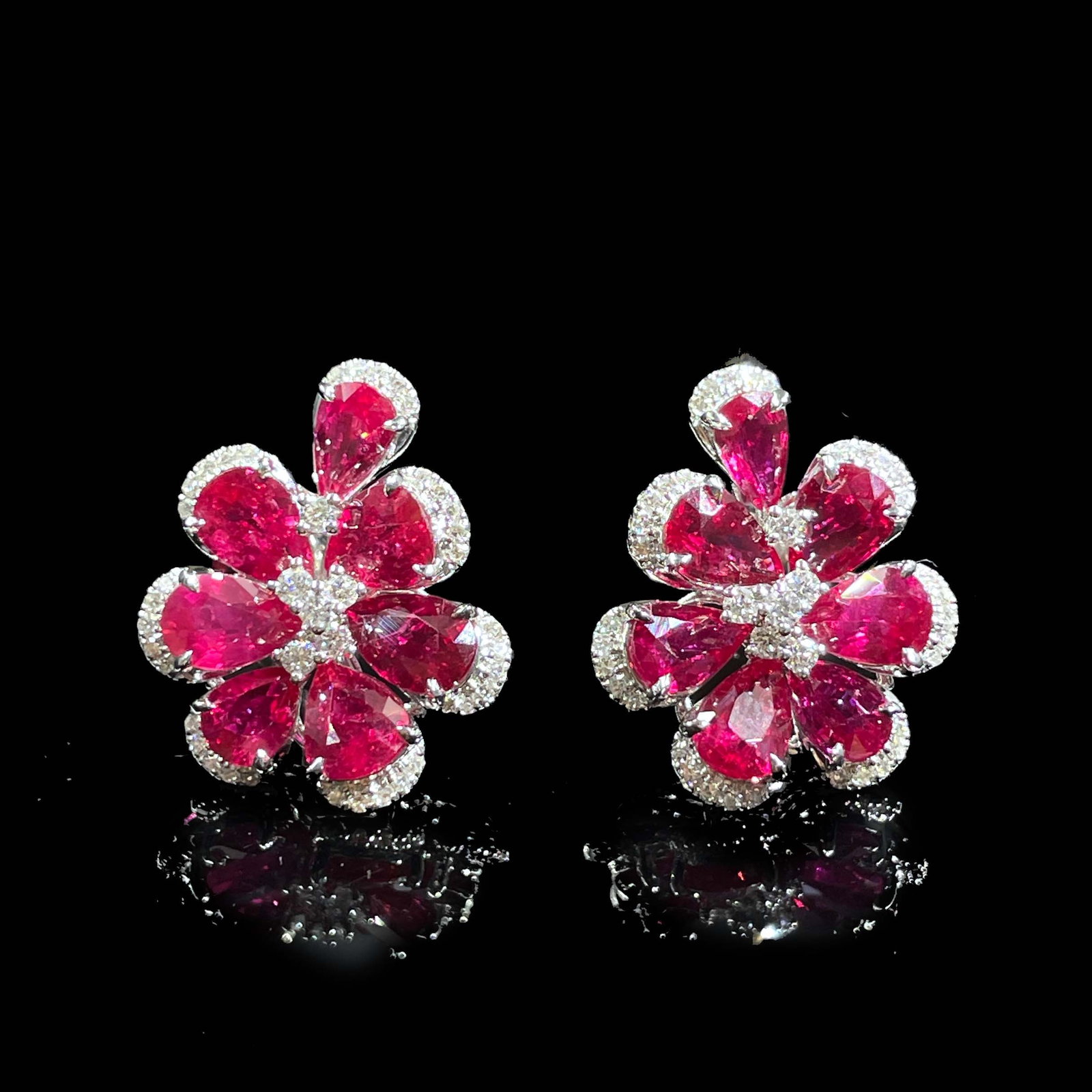 14k Gold 6.58 Ctw Natural Ruby & Diamond Earrings: Ref:231168377 // gold content:14k gold // main gemstone:ruby // shape:pear // carat weight:6. 3ct // color:red // treatment:natural // // adjacent gemstone 2 : diamond // shape:round // carat weight:0