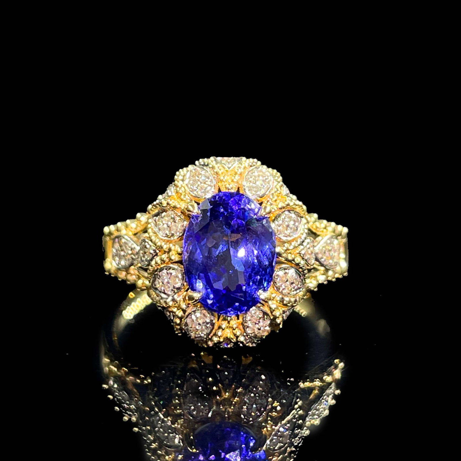 14k Gold 2.16 Ctw Natural Tanzanite & Diamond Ring: Ref:231168410 // gold content:14k gold // ring size:7. 25us // // main gemstone:tanzanite // shape:oval // carat weight:1. 9ct // color:blue // treatment:natural // // adjacent gemstone 2 : diamond