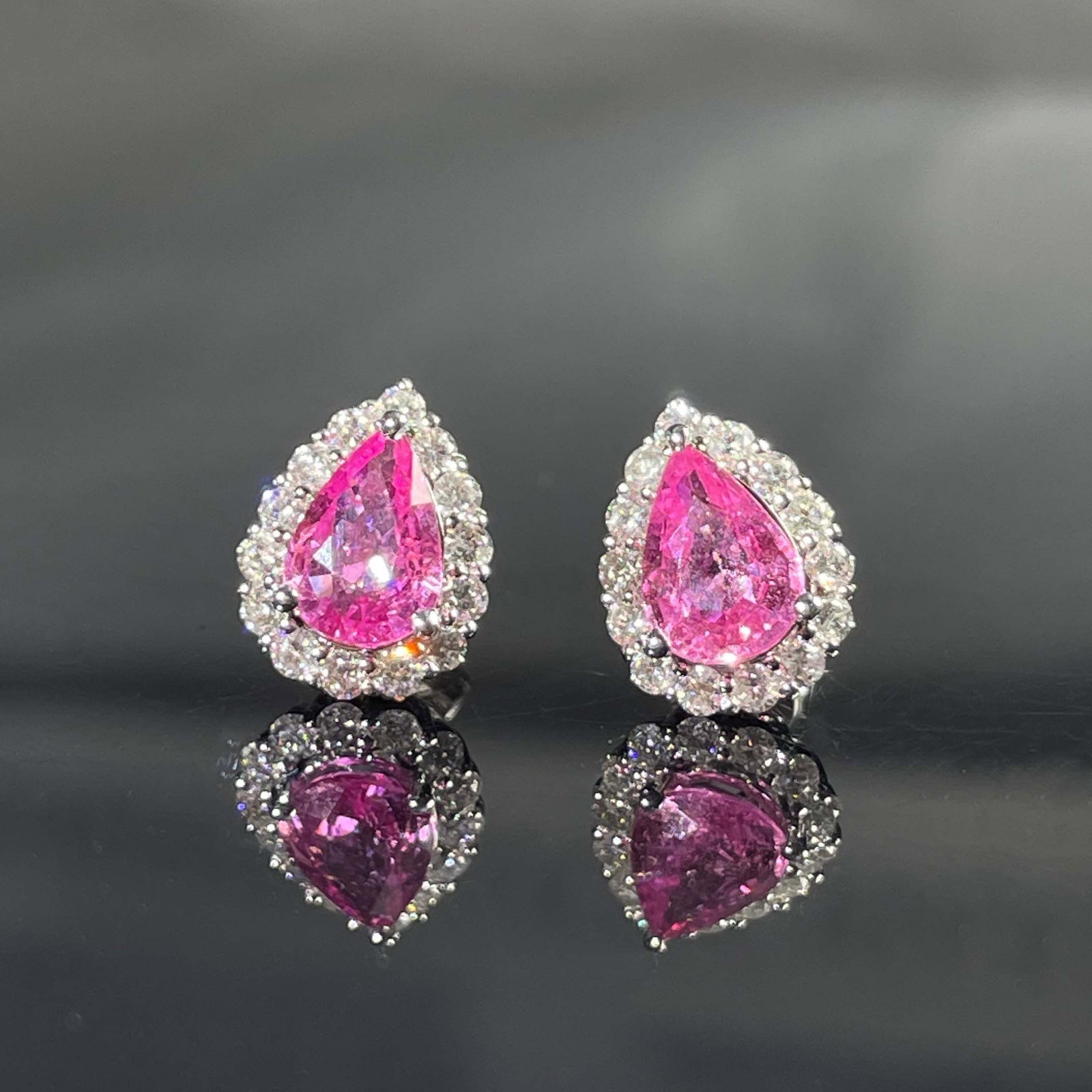 14k Gold 1.38 Ctw Natural Padparadscha Sapphire & Diamond Earrings: Ref:231168427 // gold content:14k gold // main gemstone:padparadscha sapphire // shape:pear // carat weight:1. 02ct // color:orangish pink // treatment:natural // // adjacent gemstone 2 : diamond // s