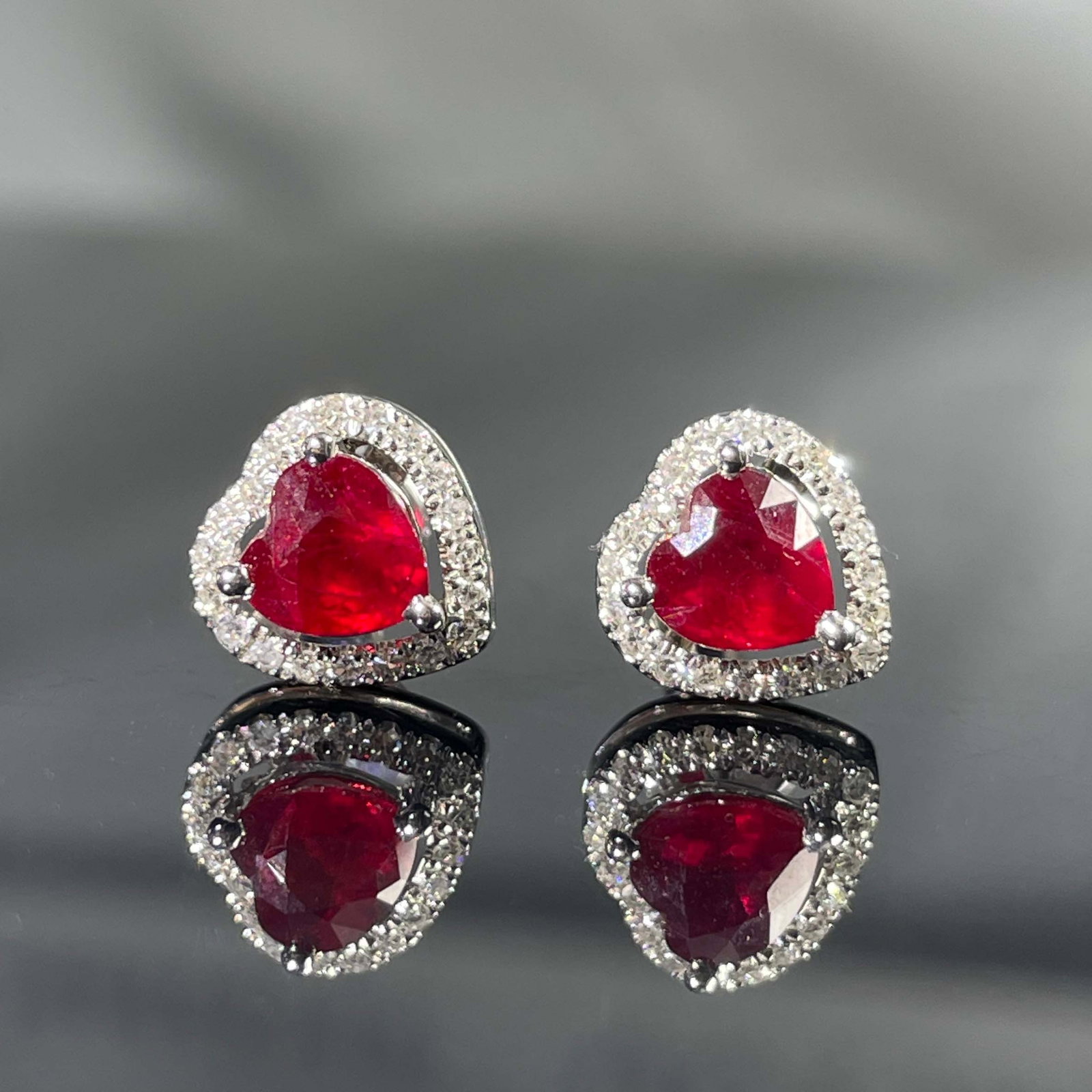 14k Gold 1.15 Ctw Natural Ruby & Diamond Earrings: Ref:231168430 // gold content:14k gold // main gemstone:ruby // shape:heart // carat weight:1. 02ct // color:red // treatment:natural // // adjacent gemstone 2 : diamond // shape:round // carat