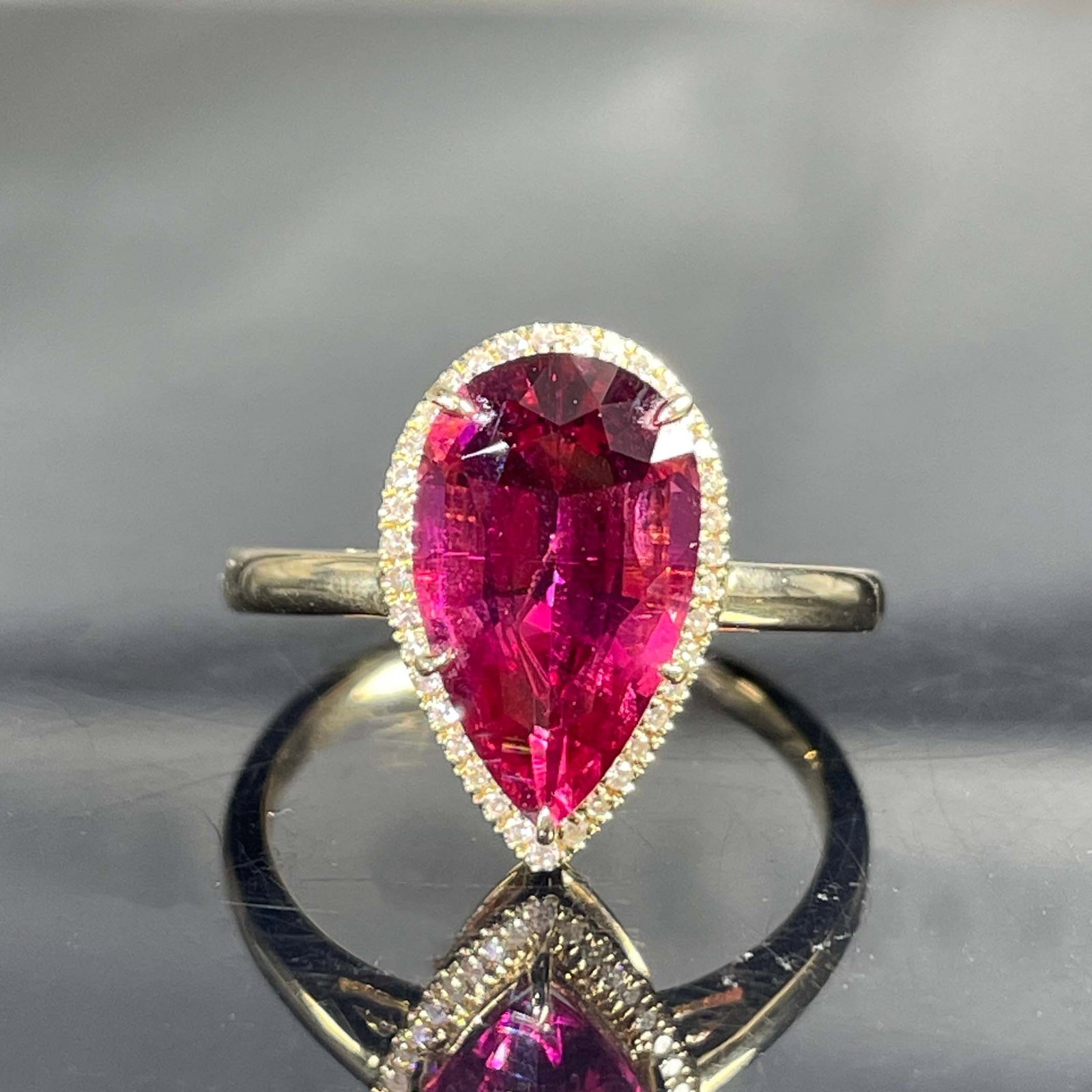 14k Gold 3.28 Ctw Natural Tourmaline & Diamond Ring: Ref:231168431 // gold content:14k gold // ring size:7. 25us // // main gemstone:tourmaline // shape:pear // carat weight:2. 9ct // color:red // treatment:natural // // adjacent gemstone 2 : diamond