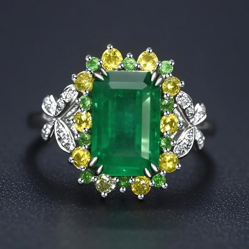 14k Gold 2.96 Ctw Natural Emerald & Sapphire Ring: Ref:231171005 // gold content:14k gold // ring size:7. 25us // // main gemstone:emerald // shape:octagonal // carat weight:2. 68ct // color:green // treatment:natural // // adjacent gemstone 2 :