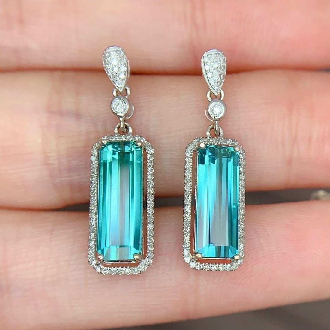 14k Gold 4.2 Ct Natural Tourmaline & Diamond Earrings: Ref:231171021 // gold content:14k gold // main gemstone:tourmaline // shape:octagonal // carat weight:4. 2ct // color:blue // treatment:natural // // adjacent gemstone 2 : diamond // shape:round //