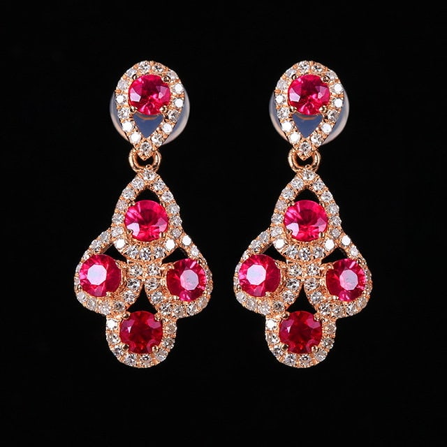 14k Gold 1.66 Ctw Natural Ruby & Diamond Earrings: Ref:231171038 // gold content:14k gold // main gemstone:ruby // shape:round // carat weight:1. 28ct // color:red // treatment:natural // cut grade:g // // adjacent gemstone 2 : diamond // number of