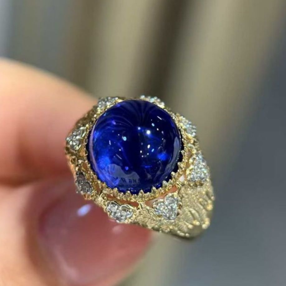 14k Gold 6.63 Ct Natural Tanzanite & Diamond Ring: Ref:231171070 // gold content:14k gold // ring size:7. 25us // // main gemstone:tanzanite // shape:round // carat weight:6. 63ct // color:blue // treatment:natural // cut grade:g // // adjacent