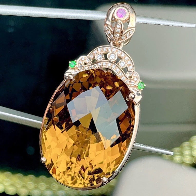 14k Gold 28.14 Ct Natural Citrine & Diamond Pendant( Without Chain ): Ref:231171122 // gold content:14k gold // main gemstone:citrine // shape:oval // carat weight:28. 14ct // color:yellow // treatment:natural // // adjacent gemstone 2 : diamond // shape:round //
