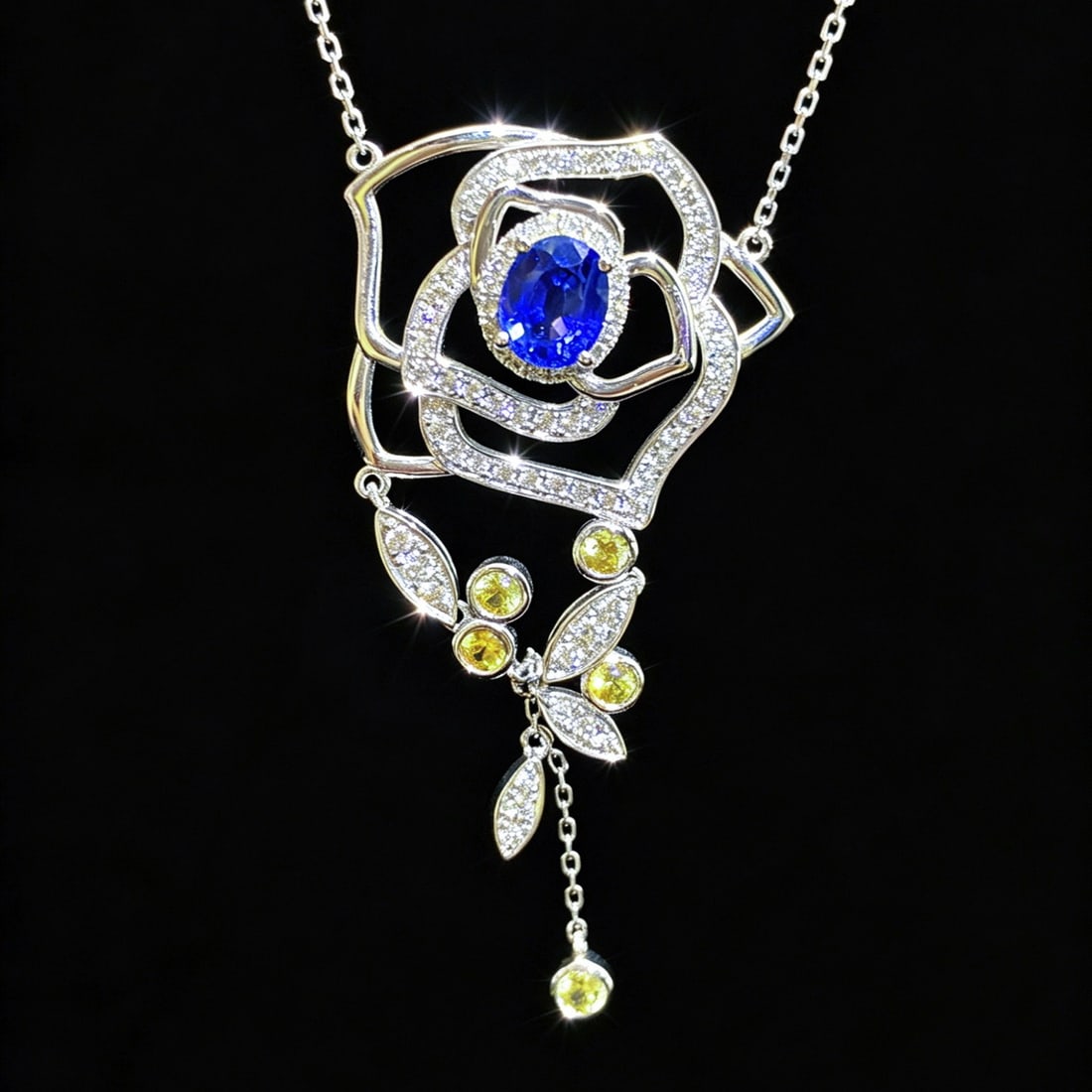 14k Gold 1.31 Ctw Natural Sapphire & Diamond & Flowers Necklace: Ref:231171139 // gold content:14k gold // main gemstone:sapphire // shape:oval // carat weight:0. 83ct // color:blue // treatment:natural // // adjacent gemstone 2 : diamond // shape:round // carat