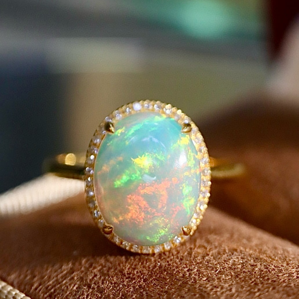 14k Gold 2.21 Ctw Natural Opal & Diamond Ring: Ref:231171222 // gold content:14k gold // ring size:7. 25us // // main gemstone:opal // shape:oval // carat weight:2. 1ct // color:color // treatment:natural // // adjacent gemstone 2 : diamond // sha