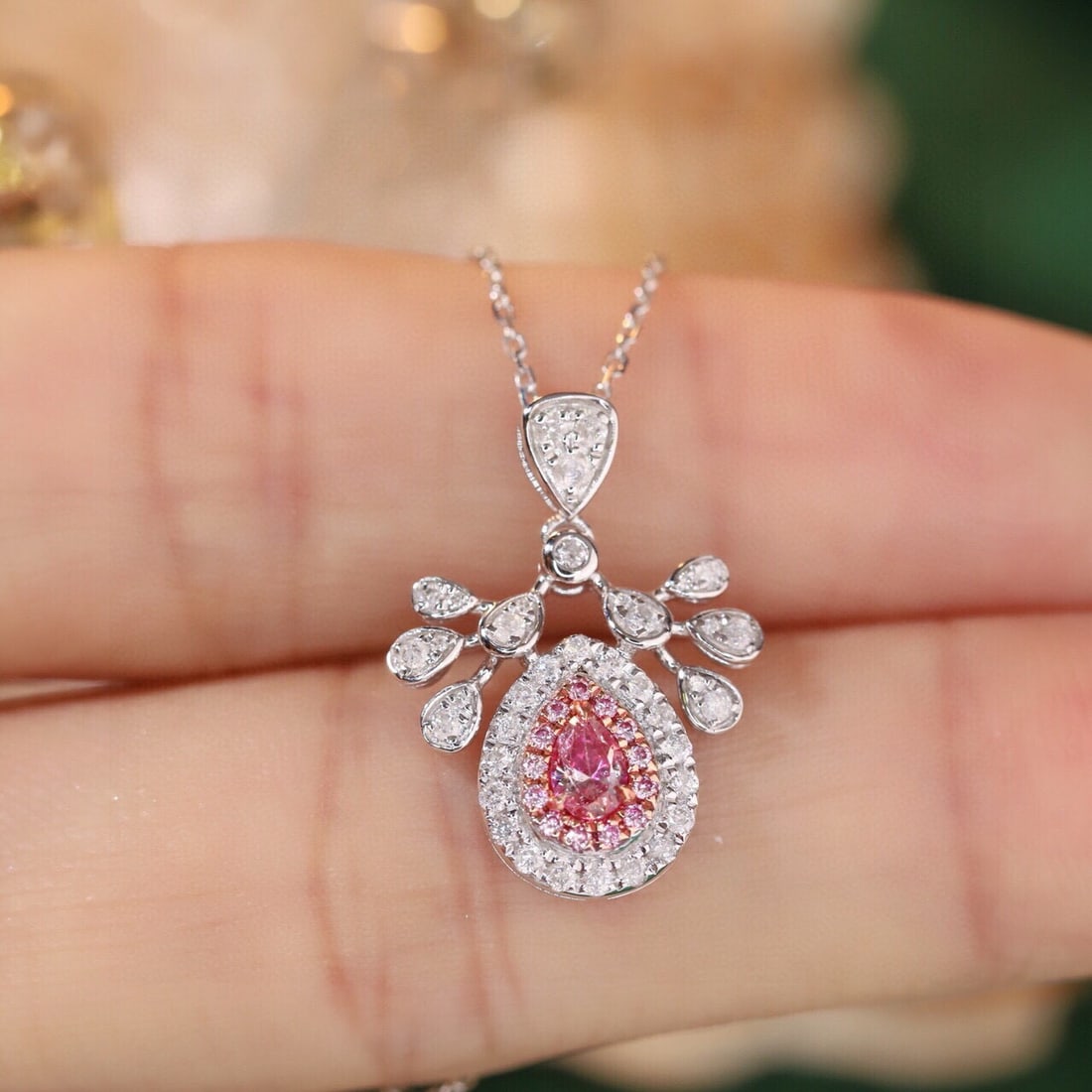 14k Gold 0.47 Ctw Natural Pink Diamond & Diamond Necklace: Ref:231171230 // gold content:14k gold // main gemstone:pink diamond // shape:pear // carat weight:0. 17ct // color:pink // treatment:natural // // adjacent gemstone 2 : diamond // shape:round //