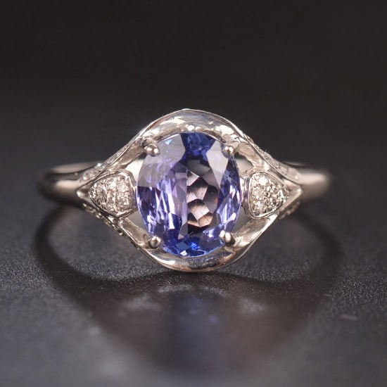 14k Gold 1.4 Ct Natural Tanzanite & Diamond Ring: Ref:231171248 // gold content:14k gold // ring size:7. 25us // // main gemstone:tanzanite // shape:oval // carat weight:1. 4ct // color:blue // treatment:natural // // adjacent gemstone 2 : diamond