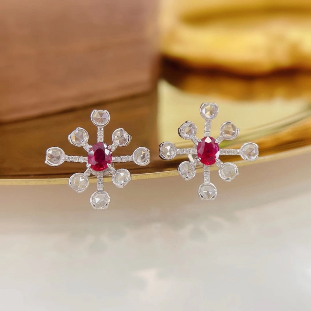 14k Gold 1.29 Ctw Natural Ruby & Diamond Earrings: Ref:231172070 // gold content:14k gold // main gemstone:ruby // shape:oval // carat weight:0. 66ct // color:red // treatment:natural // // adjacent gemstone 2 : diamond // shape:round // carat