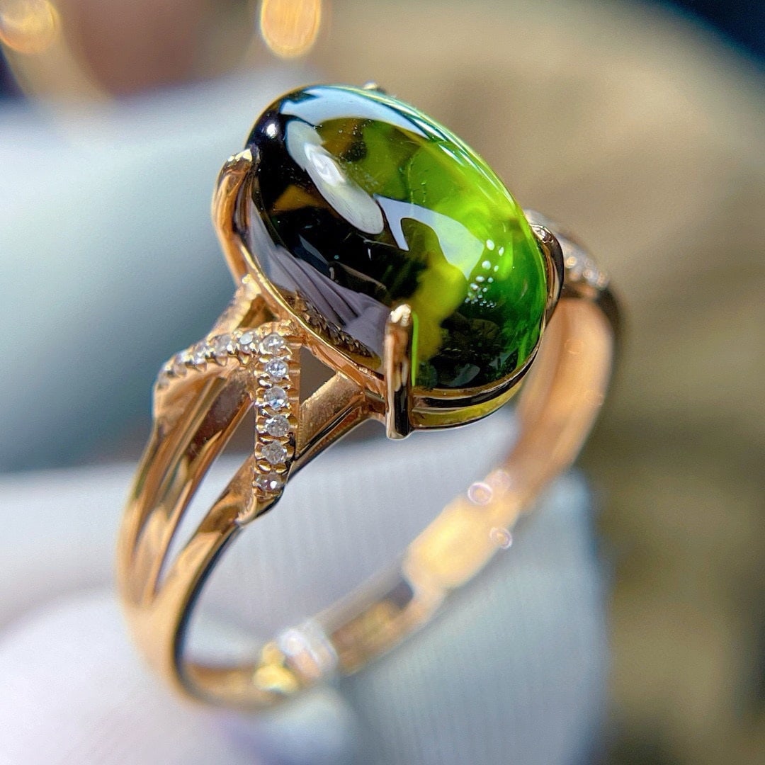 14k Gold 3.8 Ct Natural Tourmaline & Diamond Ring: Ref:231172125 // gold content:14k gold // ring size:7. 25us // // main gemstone:tourmaline // shape:oval // carat weight:3. 8ct // color:green // treatment:natural // // adjacent gemstone 2 : diamond