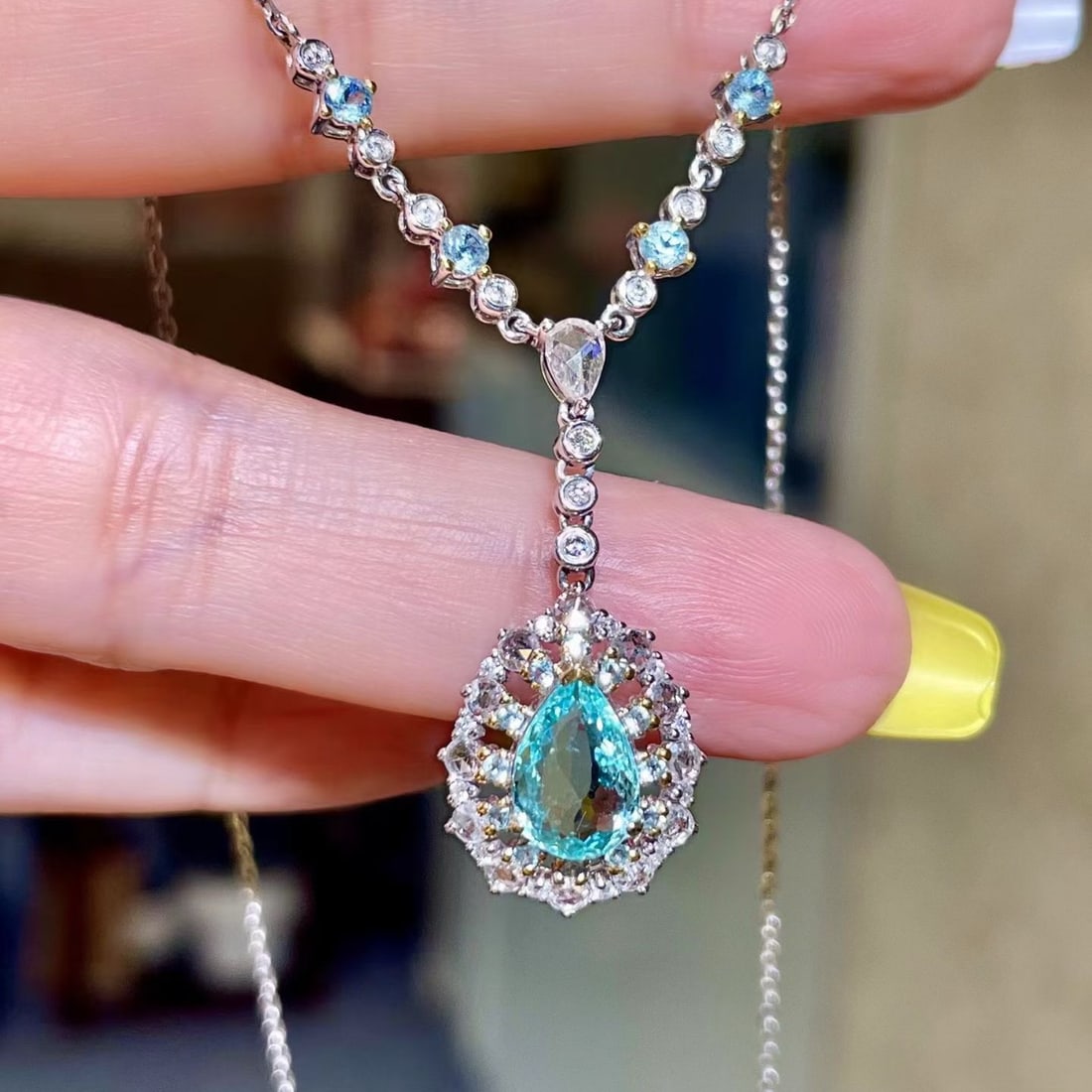 14k Gold 1.95 Ctw Natural Paraiba Tourmaline & Diamond Necklace: Ref:231172158 // gold content:14k gold // main gemstone:paraiba tourmaline // shape:pear // carat weight:1. 20ct // color:blue // treatment:natural // // adjacent gemstone 2 : diamond // shape:round /