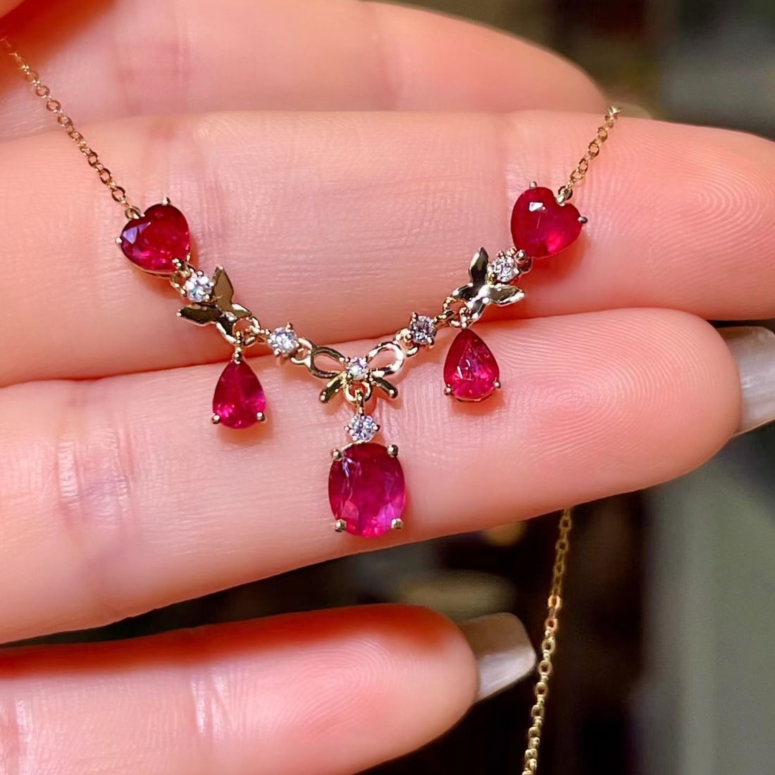 14k Gold 2.28 Ctw Natural Ruby & Diamond Necklace: Ref:231172186 // gold content:14k gold // main gemstone:ruby // shape:multiple // carat weight:2. 16ct // color:red // treatment:natural // // adjacent gemstone 2 : diamond // shape:round // carat
