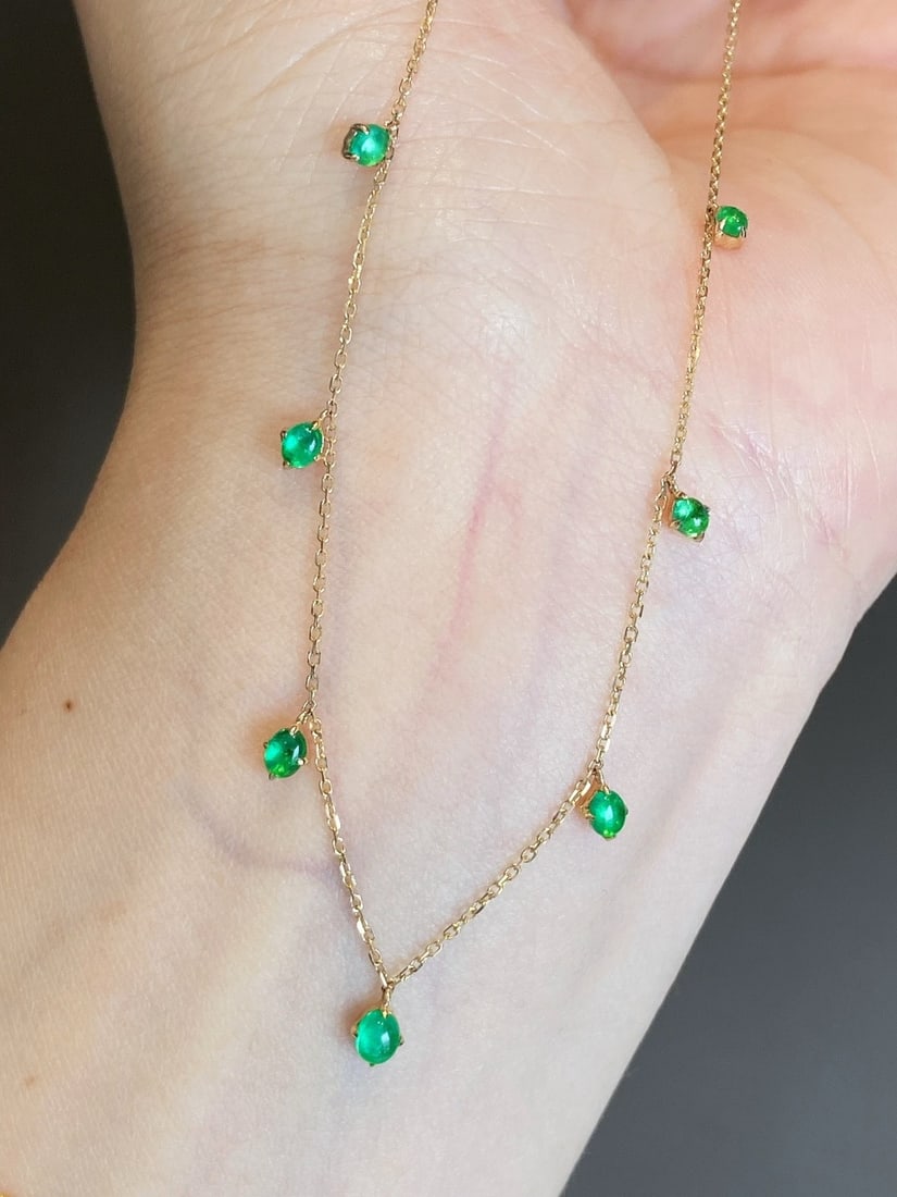 14k Gold 0.75 Ct Natural Emerald Necklace: Ref:231172239 // gold content:14k gold // main gemstone:emerald // shape:oval // carat weight:0. 75ct // color:green // treatment:natural // Low Estimate: 1400 High Estimate: 2100 Condition: New