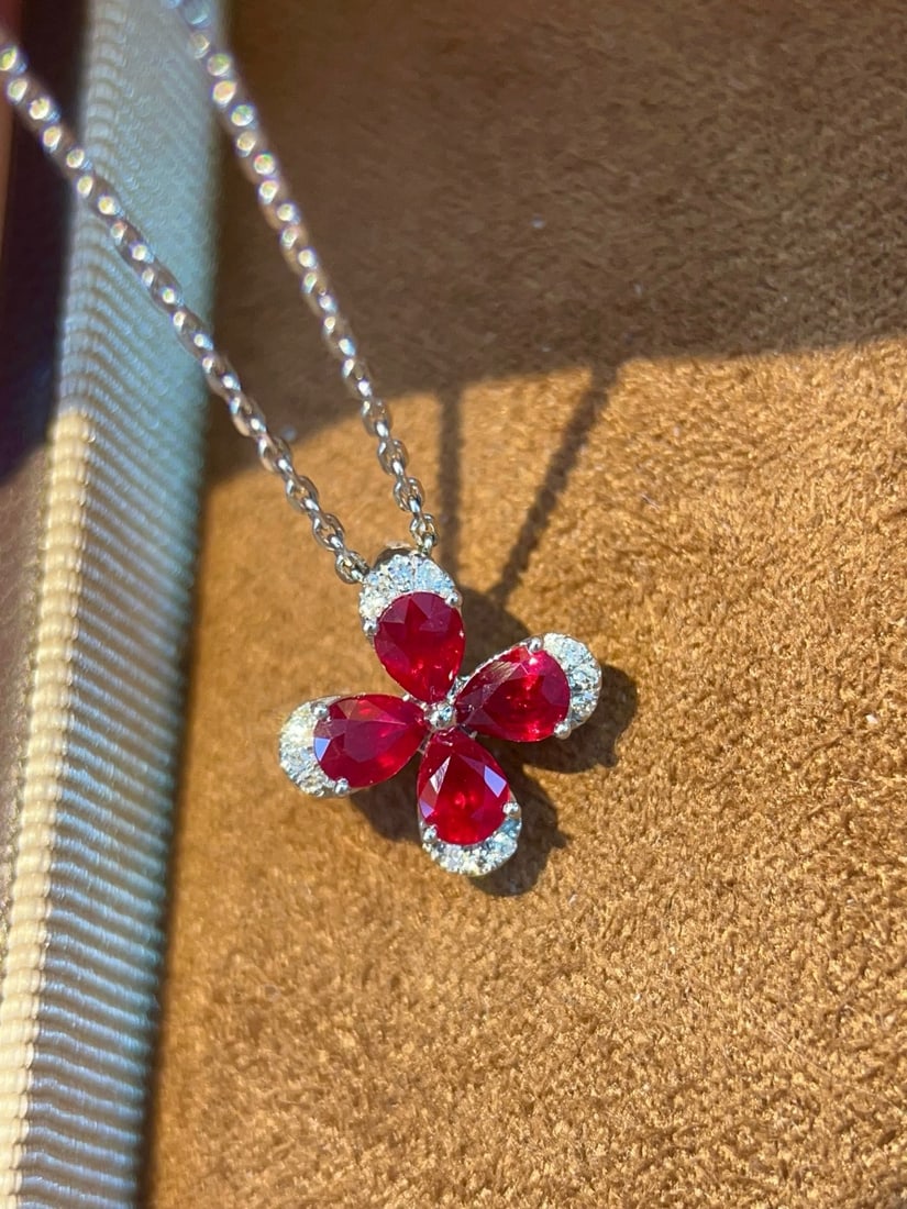 14k Gold 0.83 Ctw Natural Ruby & Diamond Pendant( Without Chain ): Ref:231172251 // gold content:14k gold // main gemstone:ruby // shape:pear // carat weight:0. 8ct // color:red // treatment:natural // // adjacent gemstone 2 : diamond // shape:round // carat