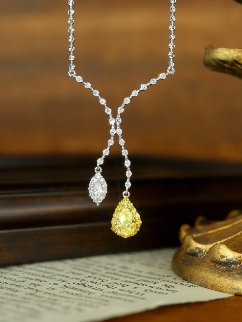 14k Gold 1.36 Ctw Natural Yellow Diamond & Diamond Necklace: Ref:231172261 // gold content:14k gold // main gemstone:yellow diamond // shape:pear // carat weight:0. 63ct // color:yellow // treatment:natural // // adjacent gemstone 2 : diamond // shape:multiple