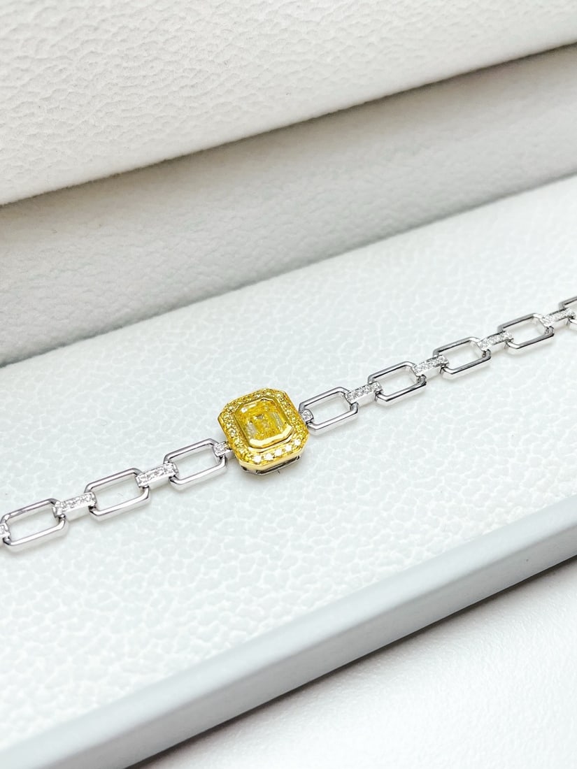14k Gold 0.77 Ctw Natural Yellow Diamond & Diamond Bracelet: Ref:231172273 // gold content:14k gold // main gemstone:yellow diamond // shape:emerald // carat weight:0. 50ct // color:yellow // treatment:natural // // adjacent gemstone 2 : diamond // shape:round