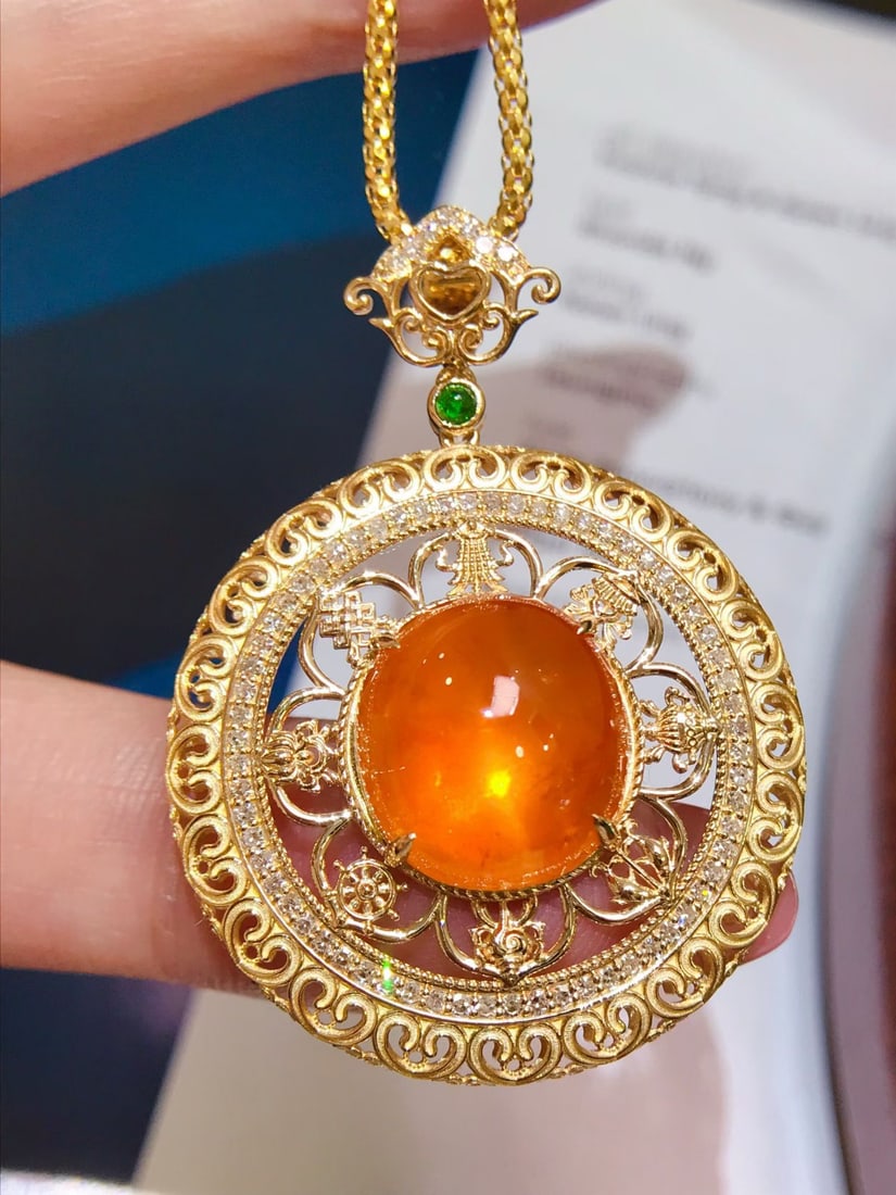 14k Gold 13.4 Ctw Natural Spessartine & Diamond Pendant( Without Chain ): Ref:231172274 // gold content:14k gold // main gemstone:spessartine // shape:oval // carat weight:13ct // color:orange // treatment:natural // // adjacent gemstone 2 : diamond // shape:round // carat