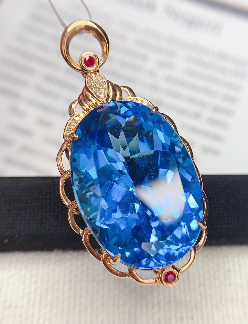 14k Gold 33 Ct Natural Topaz & Diamond Pendant( Without Chain ): Ref:231172278 // gold content:14k gold // main gemstone:topaz // shape:oval // carat weight:33ct // color:blue // treatment:natural // // adjacent gemstone 2 : diamond // shape:round // clarity