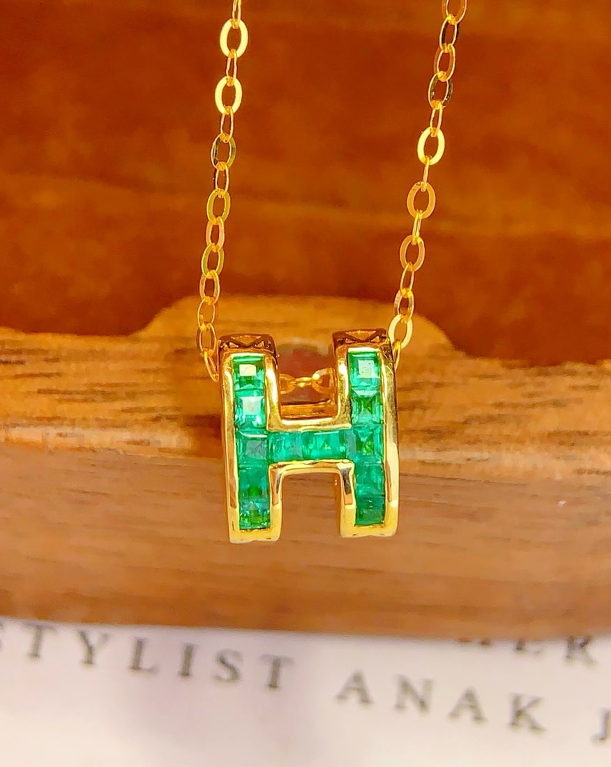 14k Gold 1 Ct Natural Emerald Necklace: Ref:231172283 // gold content:14k gold // main gemstone:emerald // shape:square // carat weight:1ct // color:green // treatment:natural // Condition: New High Estimate: 2800 Low Estimate: 1900