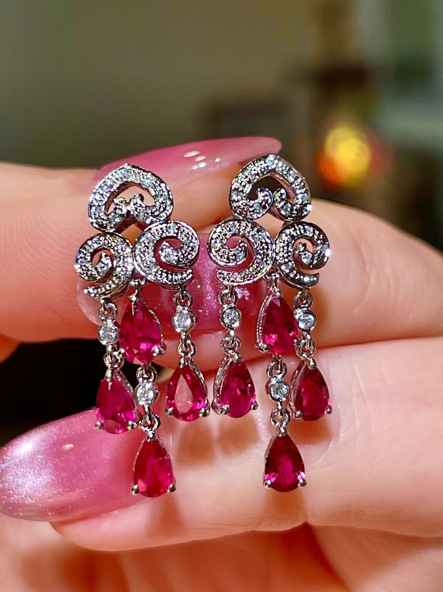 14k Gold 2.18 Ctw Natural Ruby & Diamond Earrings: Ref:231172307 // gold content:14k gold // main gemstone:ruby // shape:pear // carat weight:2. 02ct // color:red // treatment:natural // // adjacent gemstone 2 : diamond // shape:round // carat