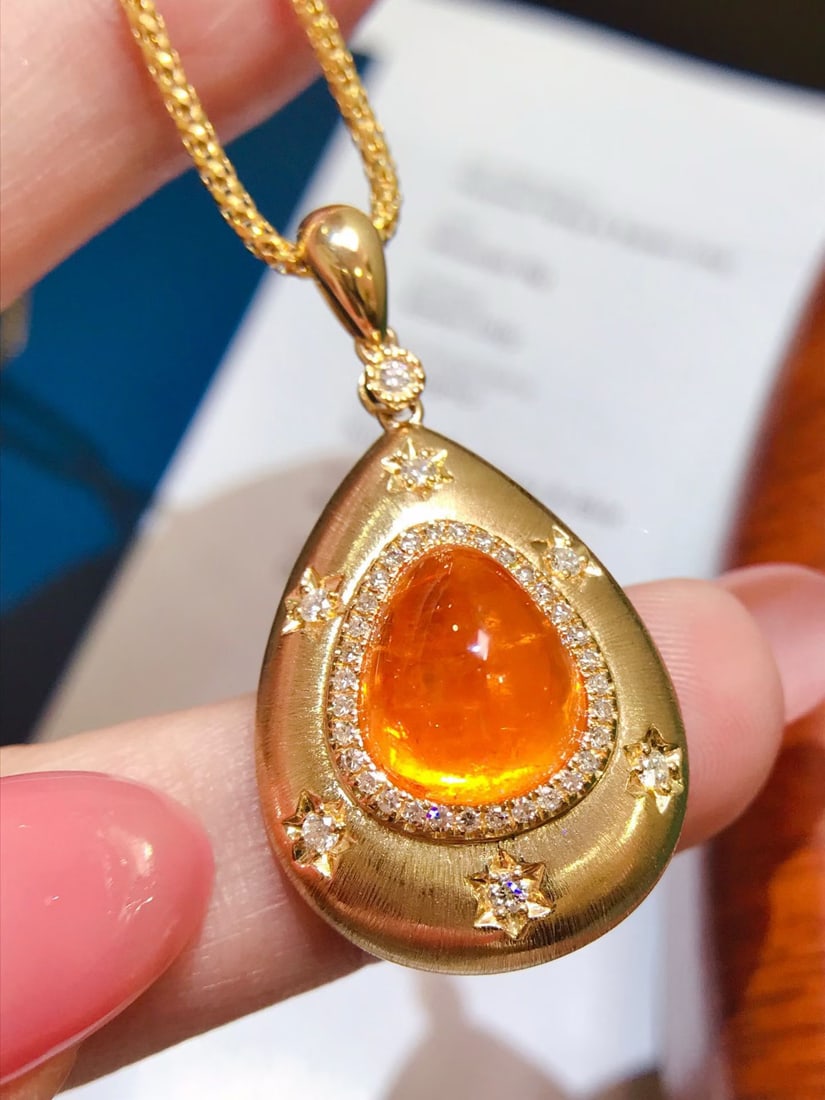 14k Gold 10.35 Ctw Natural Spessartine & Diamond Pendant( Without Chain ): Ref:231172319 // gold content:14k gold // main gemstone:spessartine // shape:pear // carat weight:10ct // color:orange // treatment:natural // // adjacent gemstone 2 : diamond // shape:round // carat