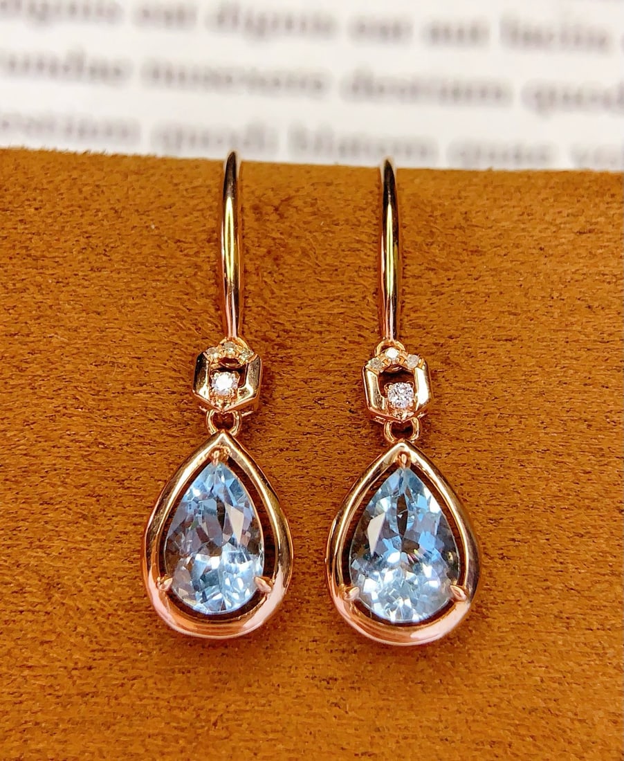 14k Gold 1.8 Ct Natural Aquamarine & Diamond Earrings: Ref:231172331 // gold content:14k gold // main gemstone:aquamarine // shape:pear // carat weight:1. 8ct // color:blue // treatment:natural // // adjacent gemstone 2 : diamond // number of stones:8 //
