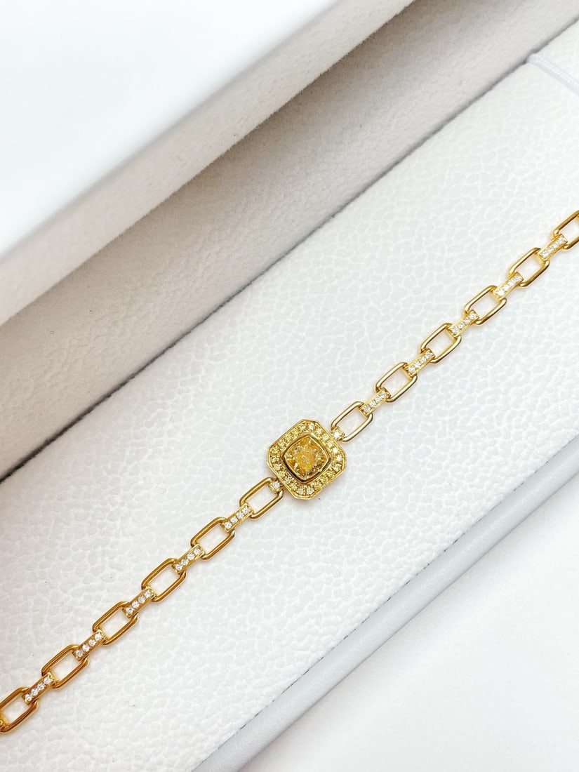 14k Gold 0.87 Ctw Natural Yellow Diamond & Diamond Bracelet: Ref:231172338 // gold content:14k gold // main gemstone:yellow diamond // shape:cushion // carat weight:0. 55ct // color:yellow // treatment:natural // // adjacent gemstone 2 : diamond // shape:round