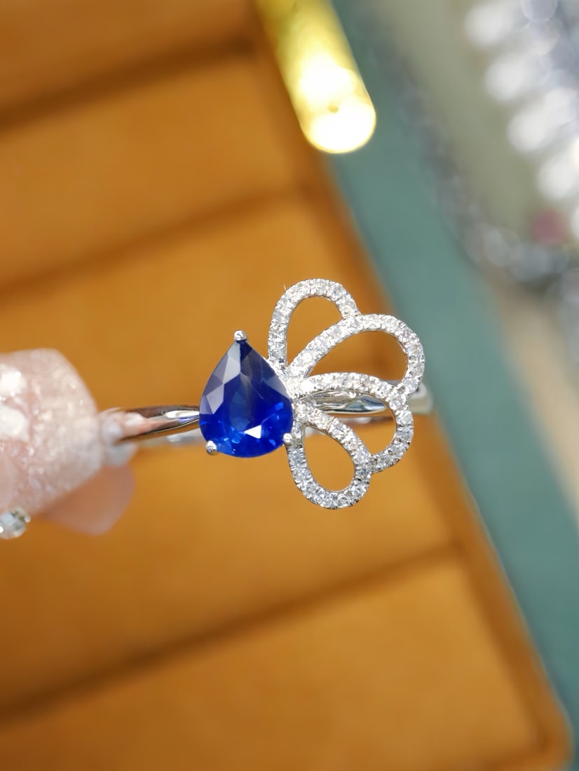 14k Gold 0.85 Ctw Natural Sapphire & Diamond Ring: Ref:231172350 // gold content:14k gold // ring size:7. 25us // // main gemstone:sapphire // shape:pear // carat weight:0. 73ct // color:blue // treatment:natural // // adjacent gemstone 2 : diamond