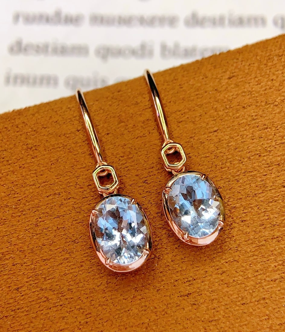 14k Gold 2.2 Ct Natural Aquamarine Earrings: Ref:231172353 // gold content:14k gold // main gemstone:aquamarine // shape:oval // carat weight:2. 2ct // color:blue // treatment:natural // Condition: New High Estimate: 2800 Low Estimate: 1900