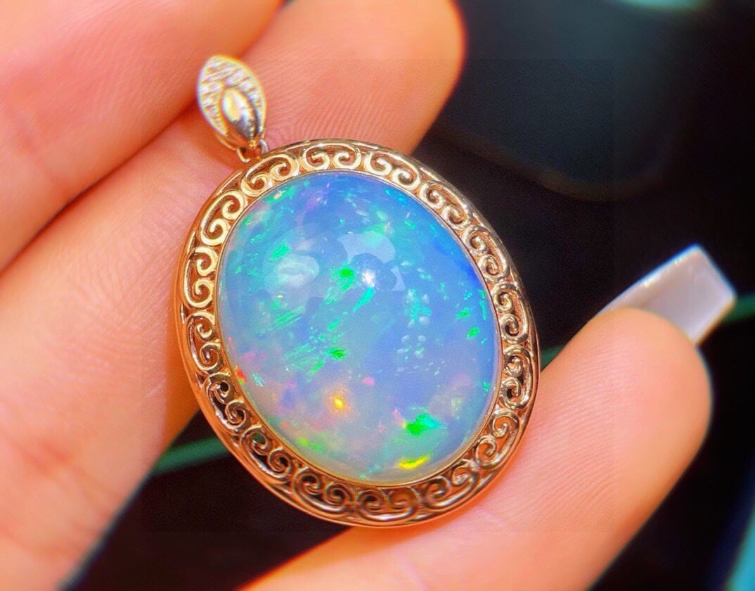 14k Gold 14.23 Ct Natural Opal & Diamond Pendant( Without Chain ): Ref:231172358 // gold content:14k gold // main gemstone:opal // shape:oval // carat weight:14. 23ct // color:color // treatment:natural // // adjacent gemstone 2 : diamond // shape:round // clarity gr