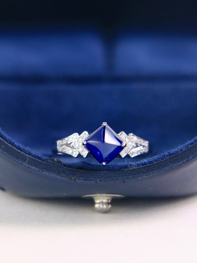 14k Gold 2.25 Ctw Vivid Blue Natural Sapphire & Diamond Ring: Ref:231172370 // gold content:14k gold // ring size:7. 25us // // main gemstone:sapphire // shape:sugar-loaf // carat weight:2. 15ct // color:vivid blue // treatment:natural // // adjacent gemstone 2 