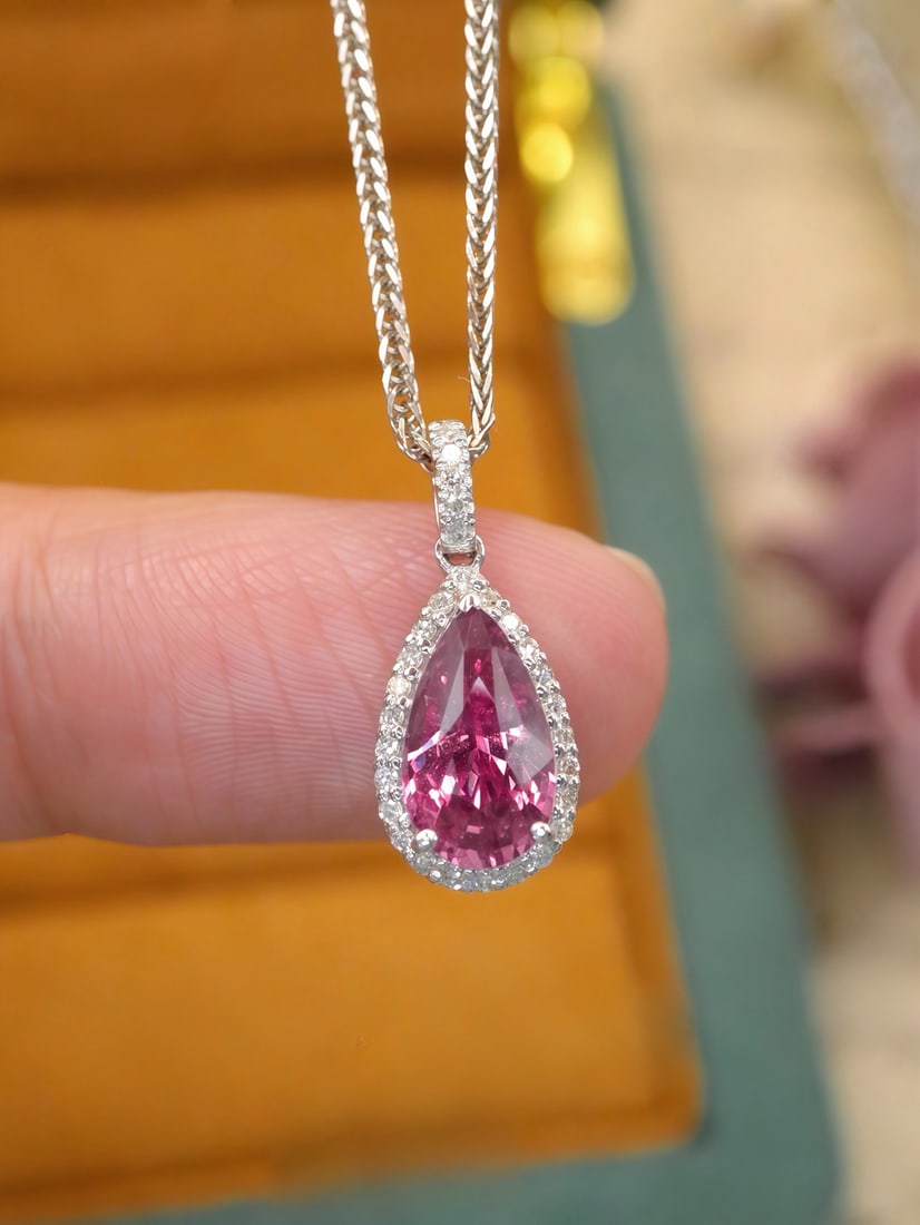 14k Gold 1.78 Ctw Natural Sapphire & Diamond Pendant( Without Chain ): Ref:231172373 // gold content:14k gold // main gemstone:sapphire // shape:pear // carat weight:1. 63ct // color:pink // treatment:natural // // adjacent gemstone 2 : diamond // number of stones:30 //